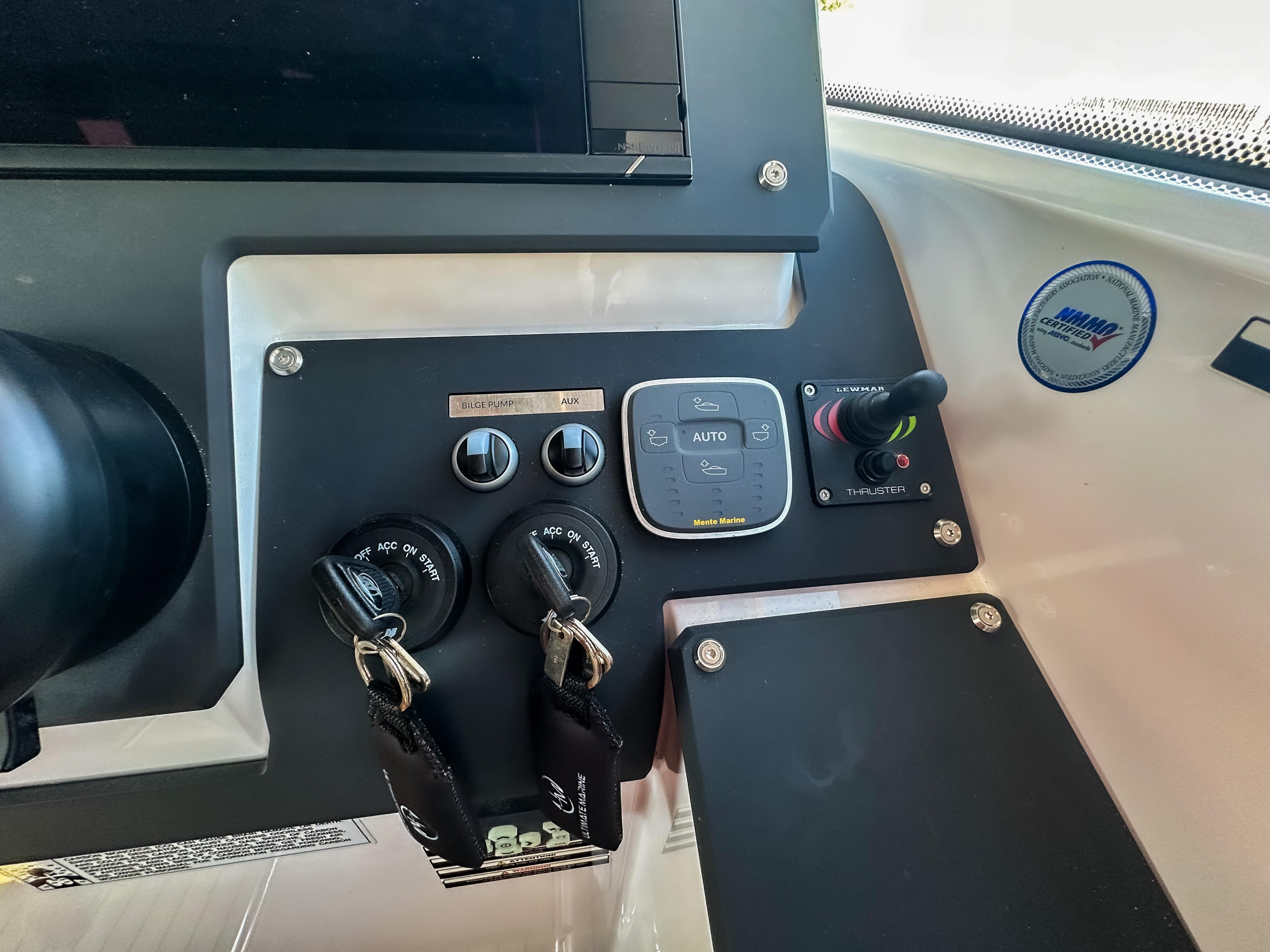 XO Boats-EXPLR 10 Sport Plus 2024 -FL-US-Control panel of 2024 XO Boats EXPLR 10 Sport Plus with ignition keys and switches.-9818089 | Thumbnail