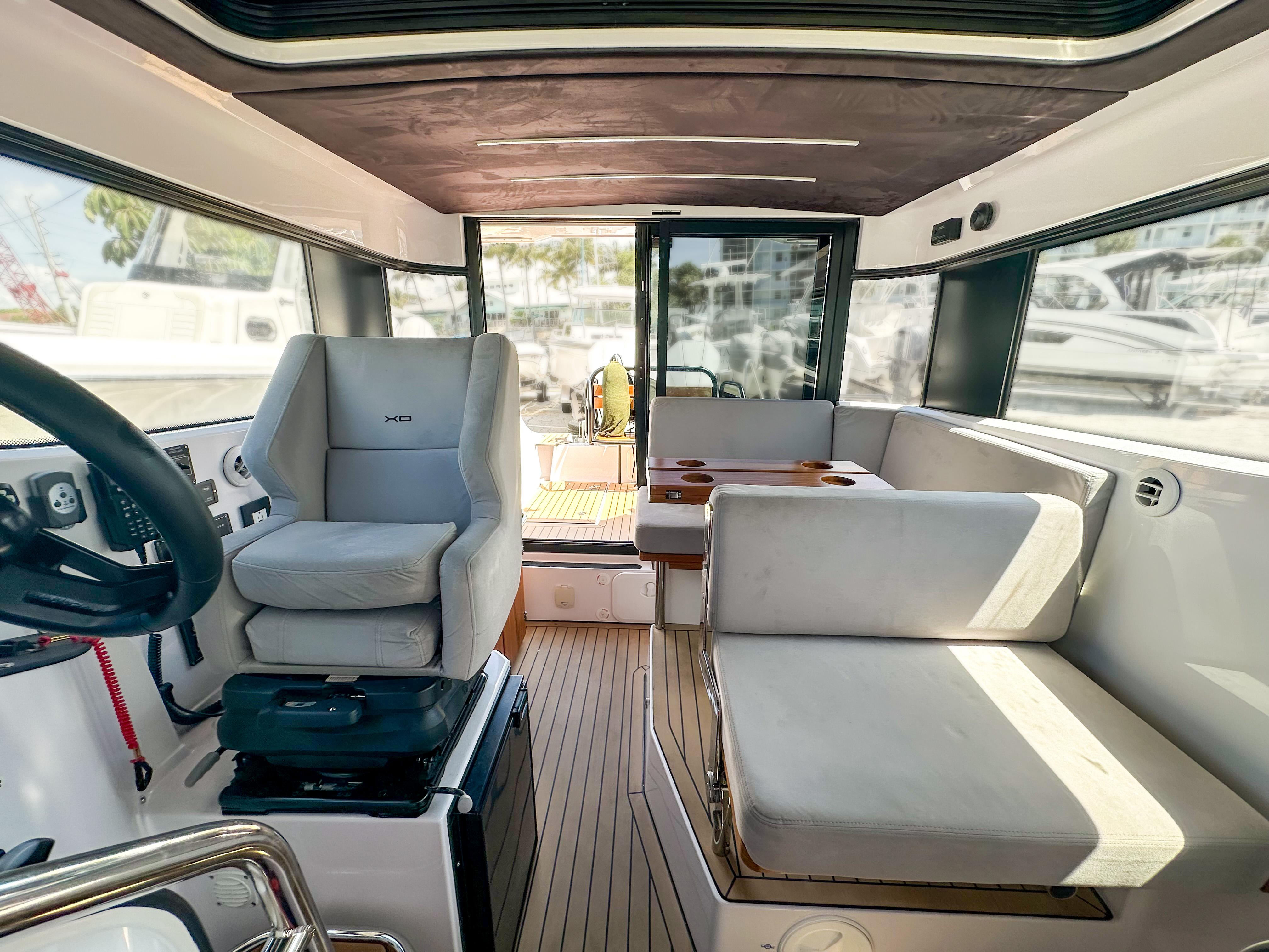 XO Boats-EXPLR 10 Sport Plus 2024 -FL-US-Interior of 2024 XO Boats EXPLR 10 Sport Plus, featuring modern seating and sleek design.-9818089 | Thumbnail