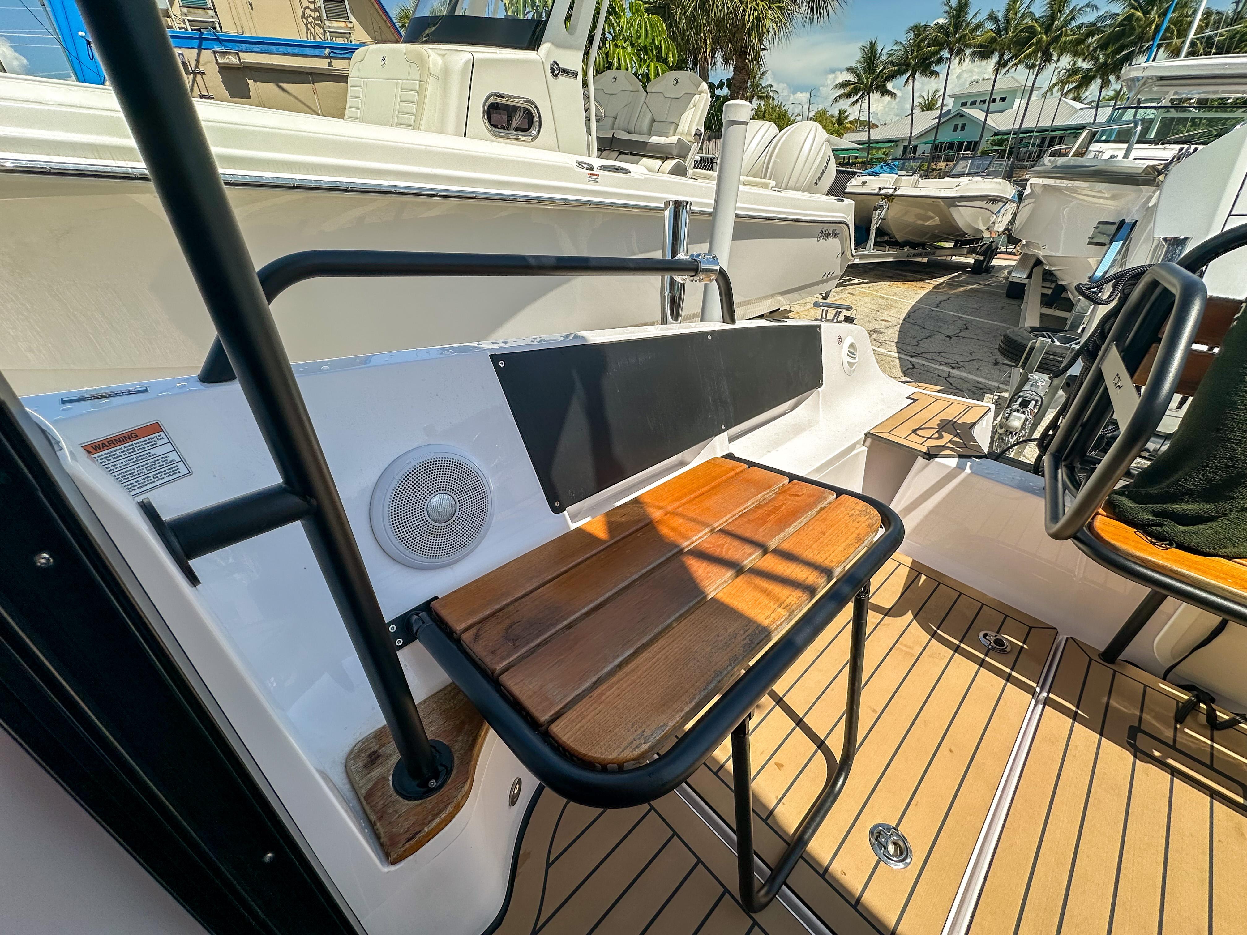 XO Boats-EXPLR 10 Sport Plus 2024 -FL-US-2024 XO Boats EXPLR 10 Sport Plus interior with wooden seating and modern design.-9818089 | Thumbnail