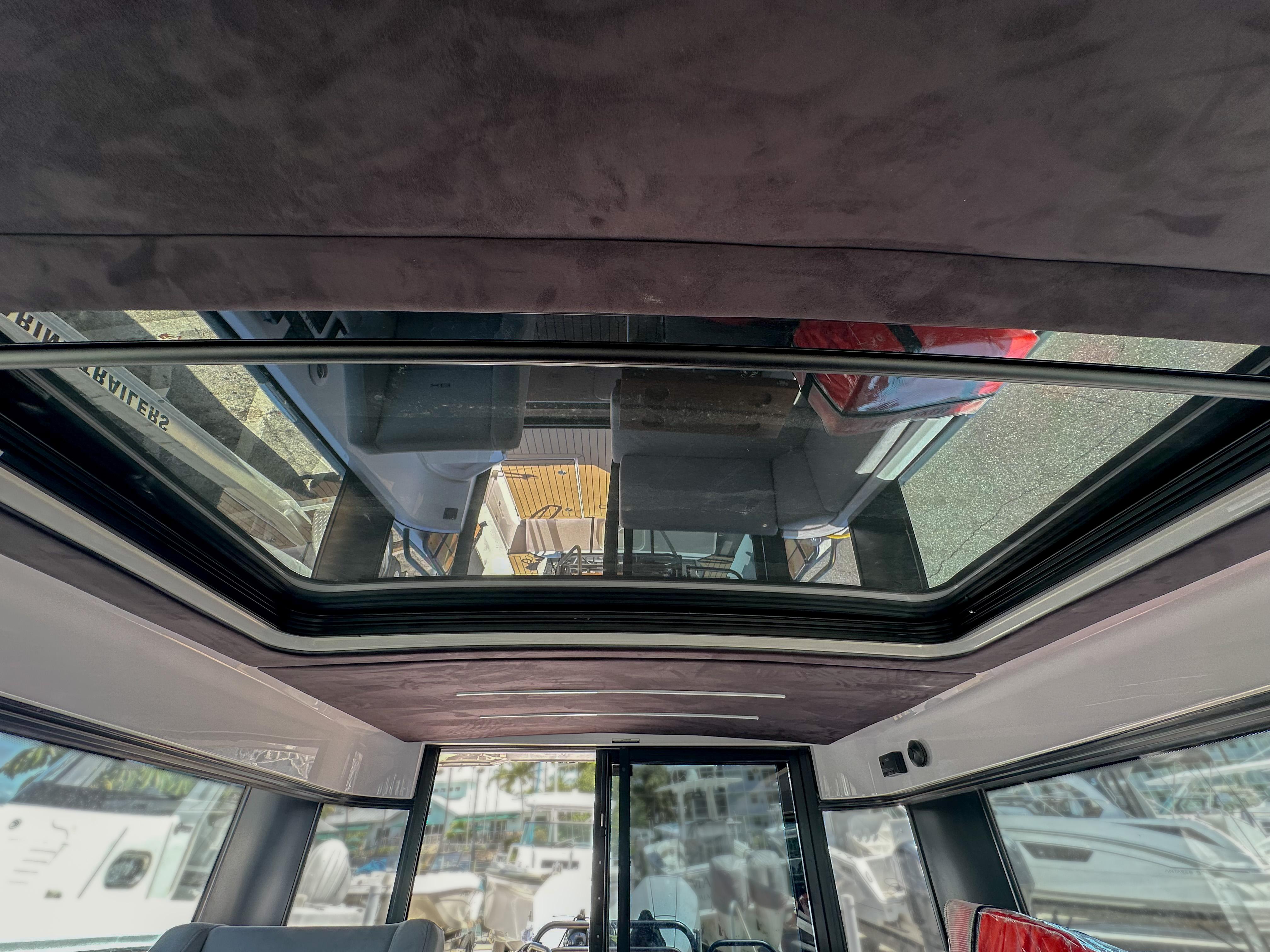 XO Boats-EXPLR 10 Sport Plus 2024 -FL-US-2024 XO Boats EXPLR 10 Sport Plus interior with panoramic sunroof view.-9818089 | Thumbnail