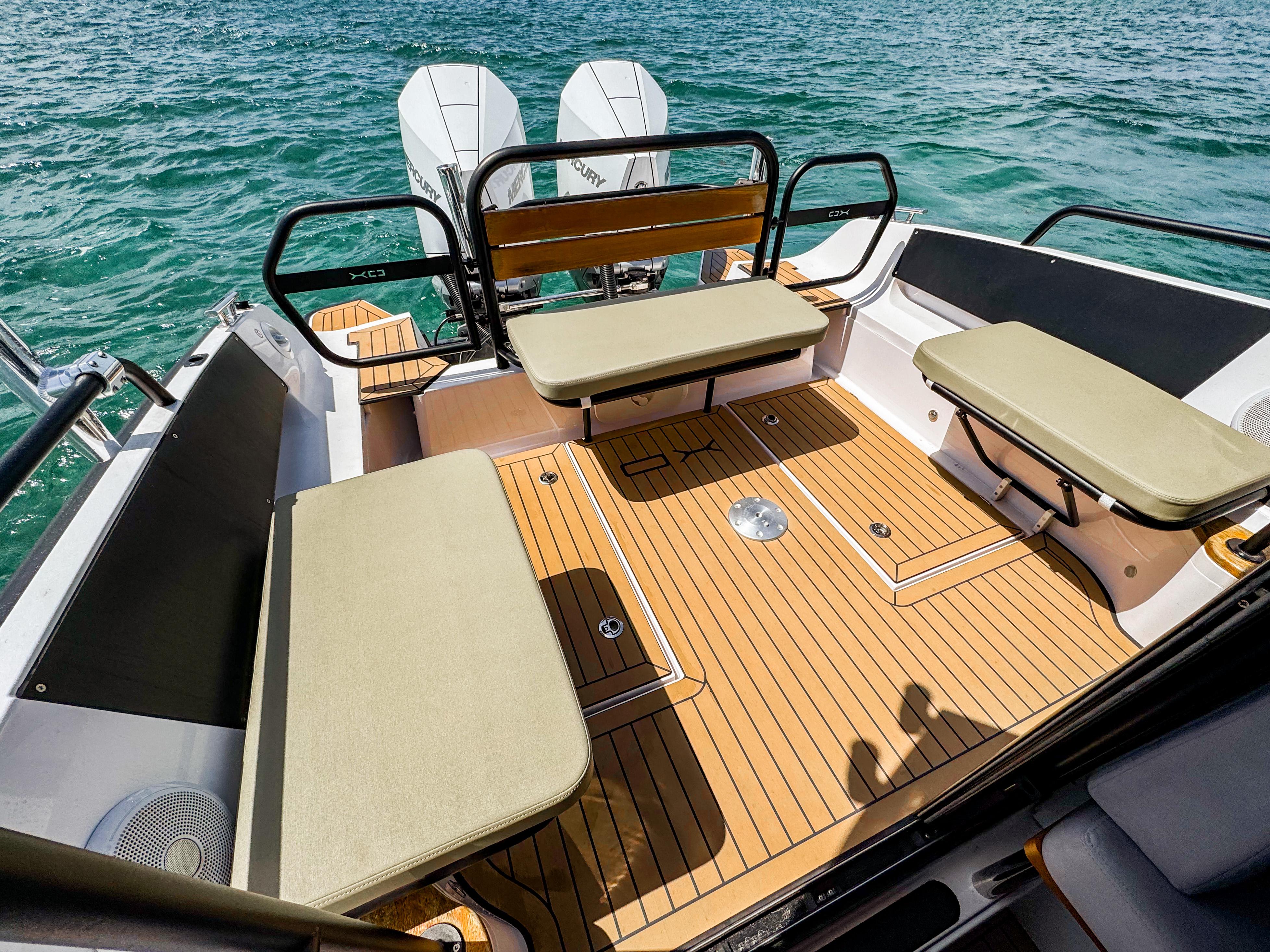 XO Boats-XO Boats EXPLR 10S Plus 2024 -FL-US-2024 XO Boats EXPLR 10S Plus interior with cushioned seating and wooden deck.-9818089 | Thumbnail