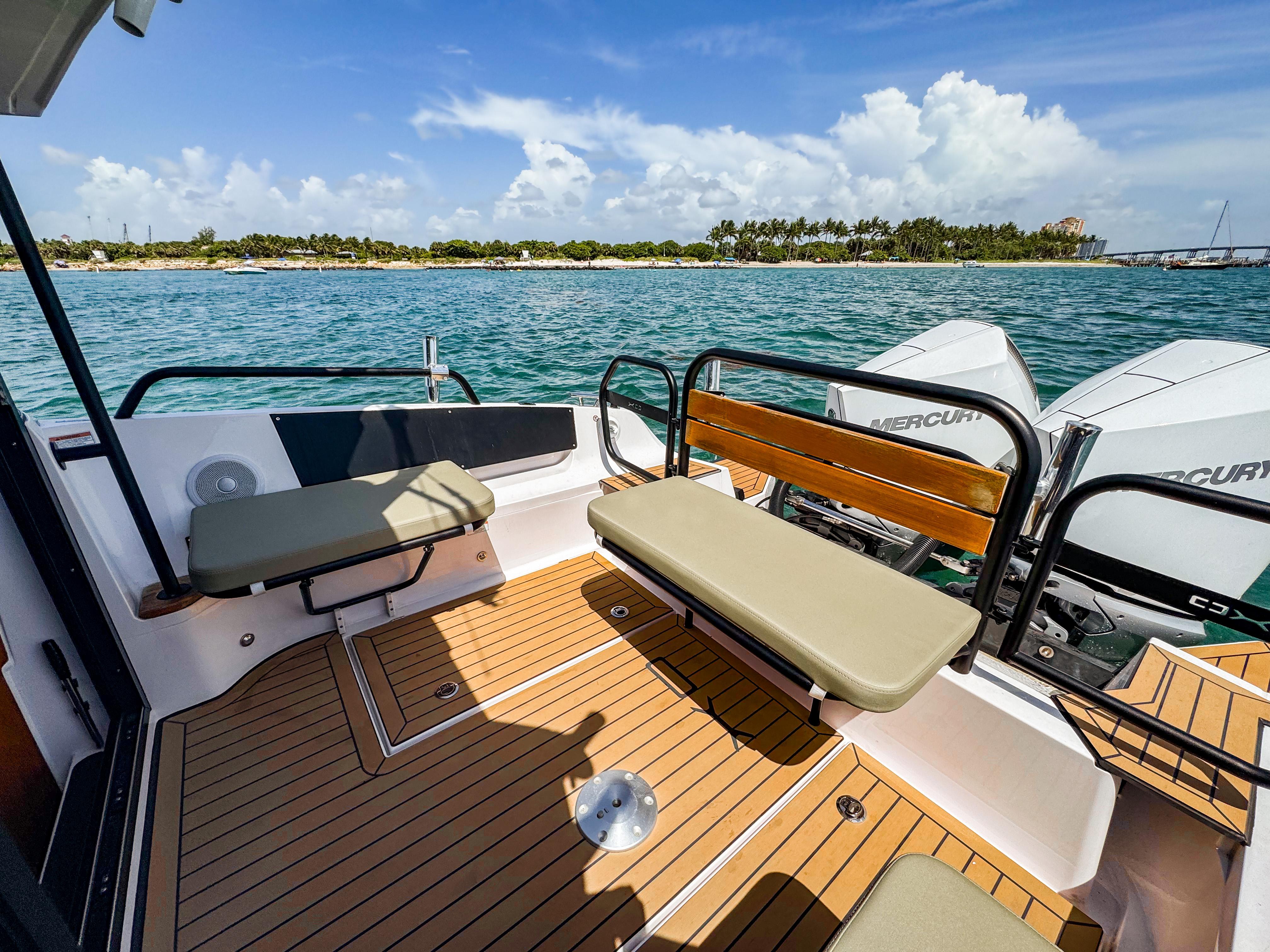 XO Boats-XO Boats EXPLR 10S Plus 2024 -FL-US-2024 XO Boats EXPLR 10S Plus deck with seating, overlooking scenic ocean view.-9818089 | Thumbnail
