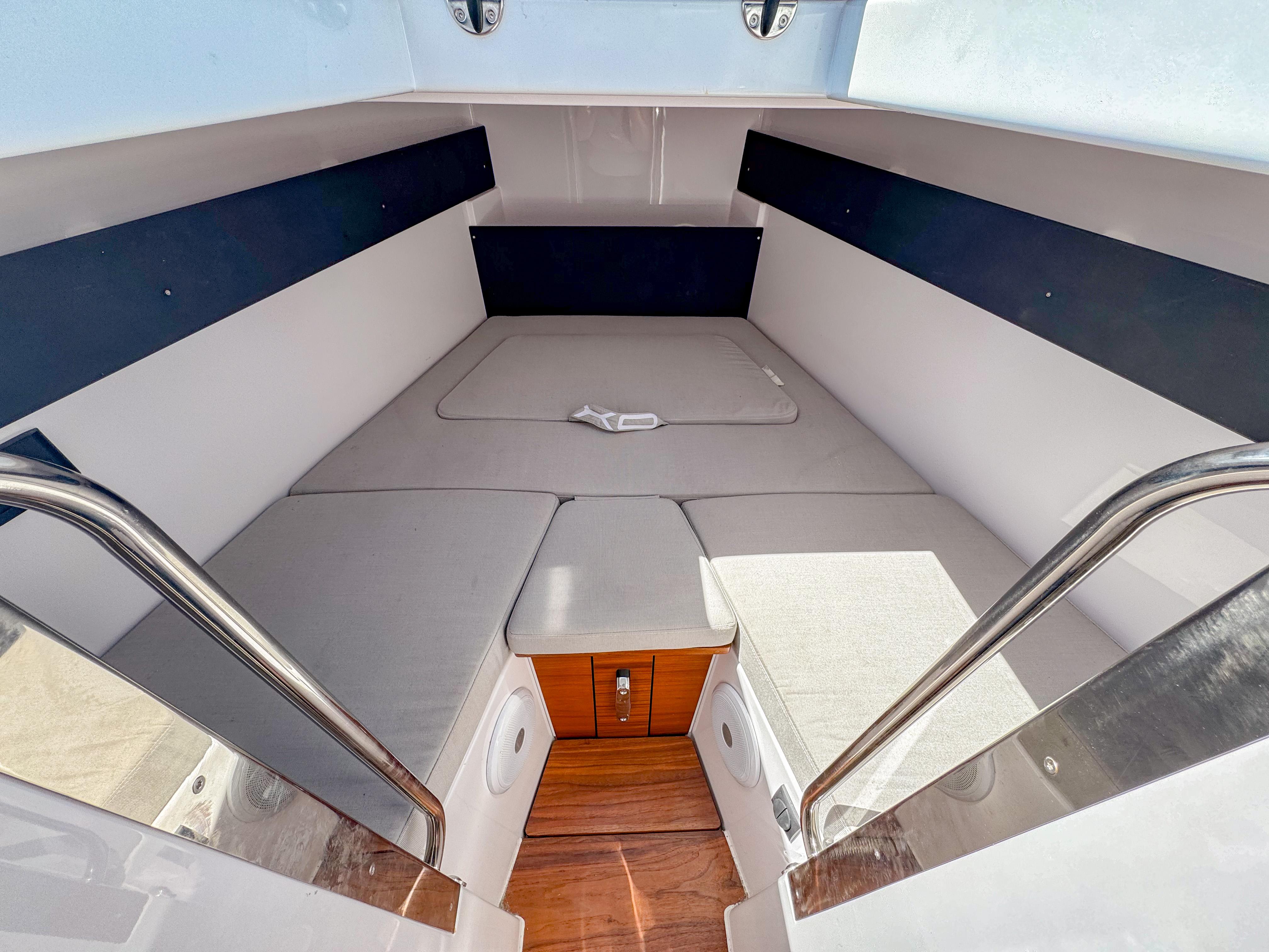 XO Boats-XO Boats EXPLR 10S Plus 2024 -FL-US-2024 XO Boats EXPLR 10S Plus interior cabin with cushioned seating and wooden flooring.-9818089 | Thumbnail