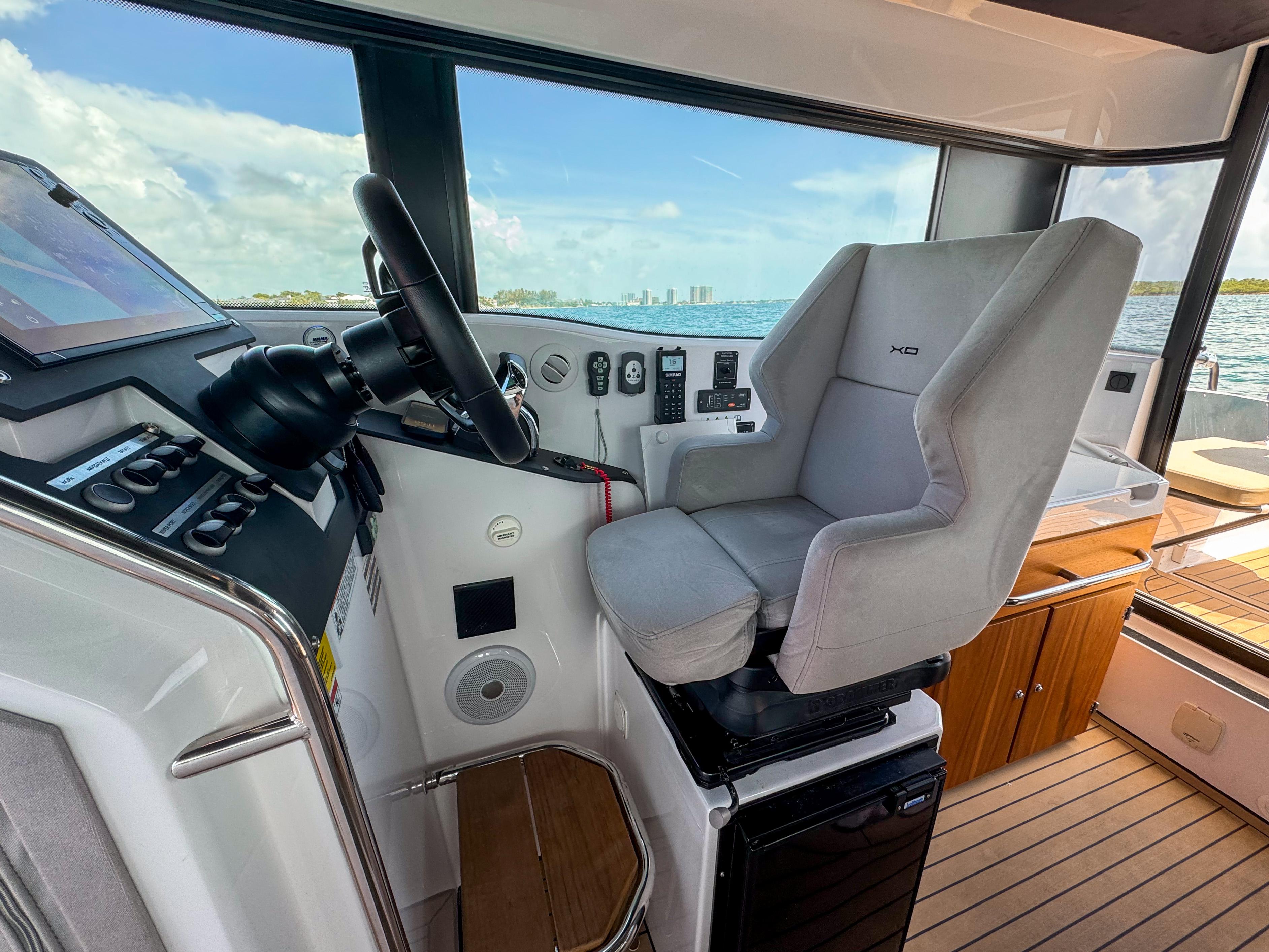 XO Boats-XO Boats EXPLR 10S Plus 2024 -FL-US-Helm of 2024 XO Boats EXPLR 10S Plus with modern controls and comfortable seating.-9818089 | Thumbnail
