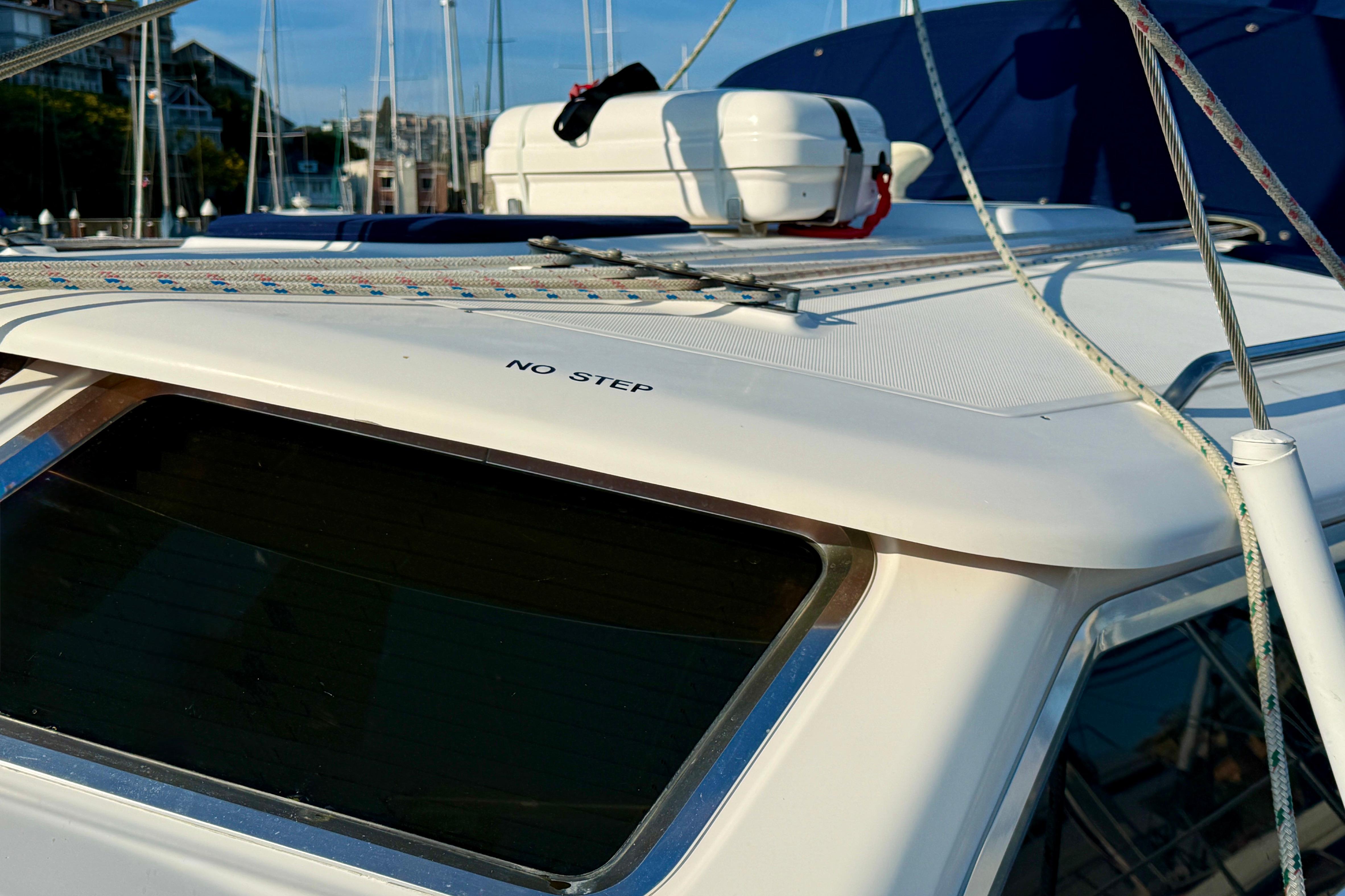 2007 Hunter 44 Deck Salon yacht with "No Step" warning on deck.