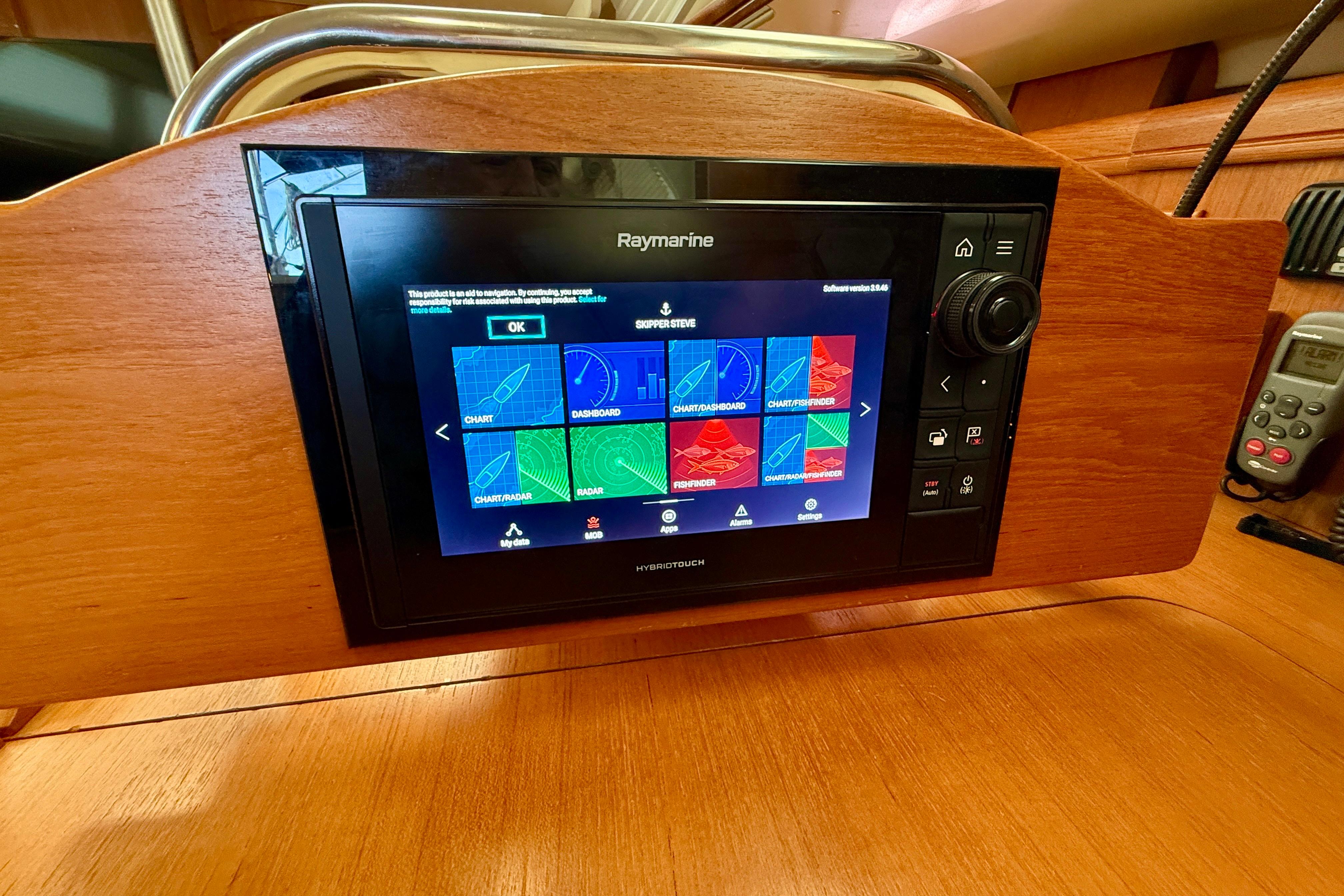 Raymarine navigation system on 2007 Hunter 44 Deck Salon yacht dashboard.
