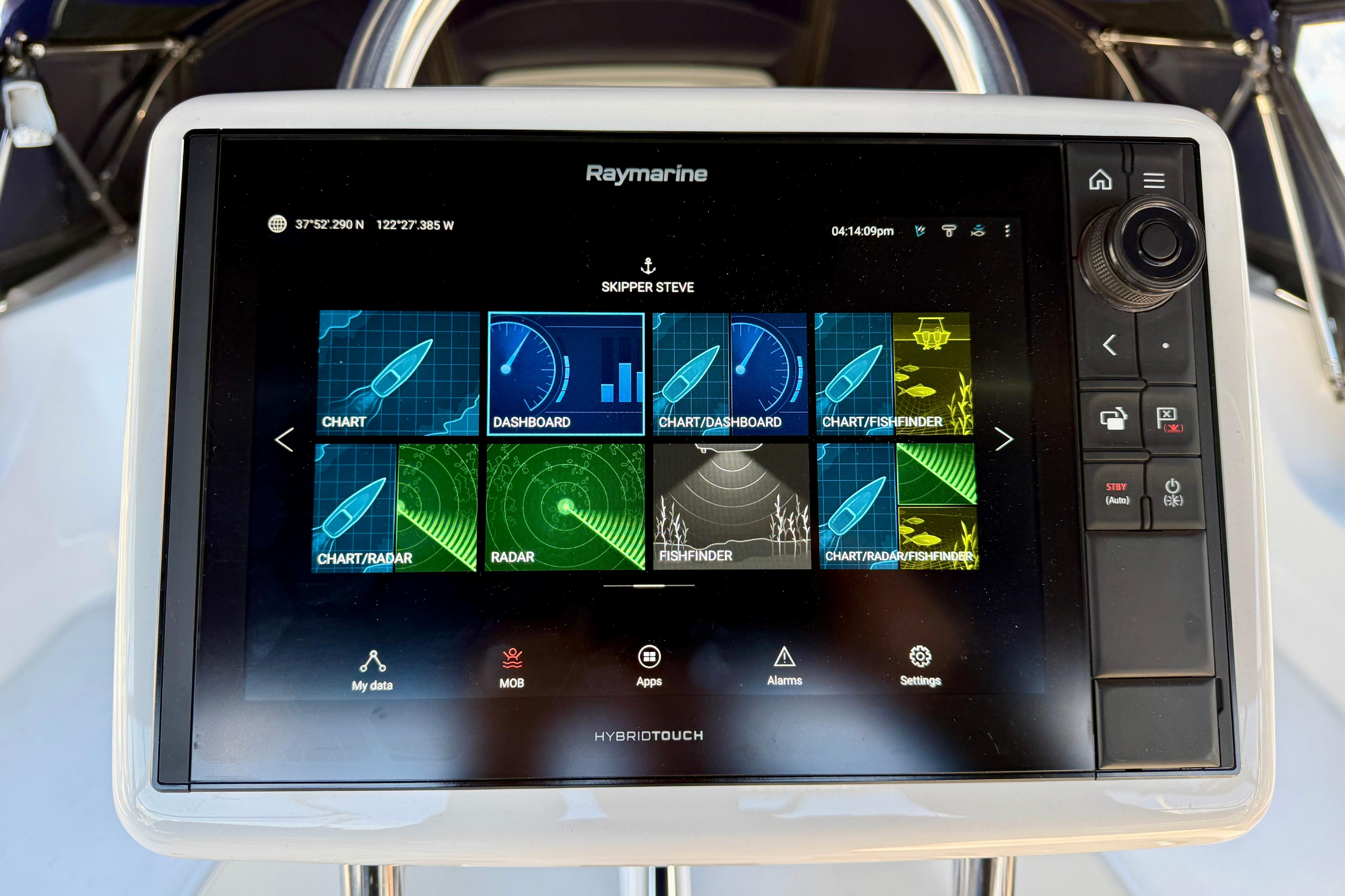 Raymarine navigation display on 2007 Hunter 44 Deck Salon yacht, showing charts and radar.