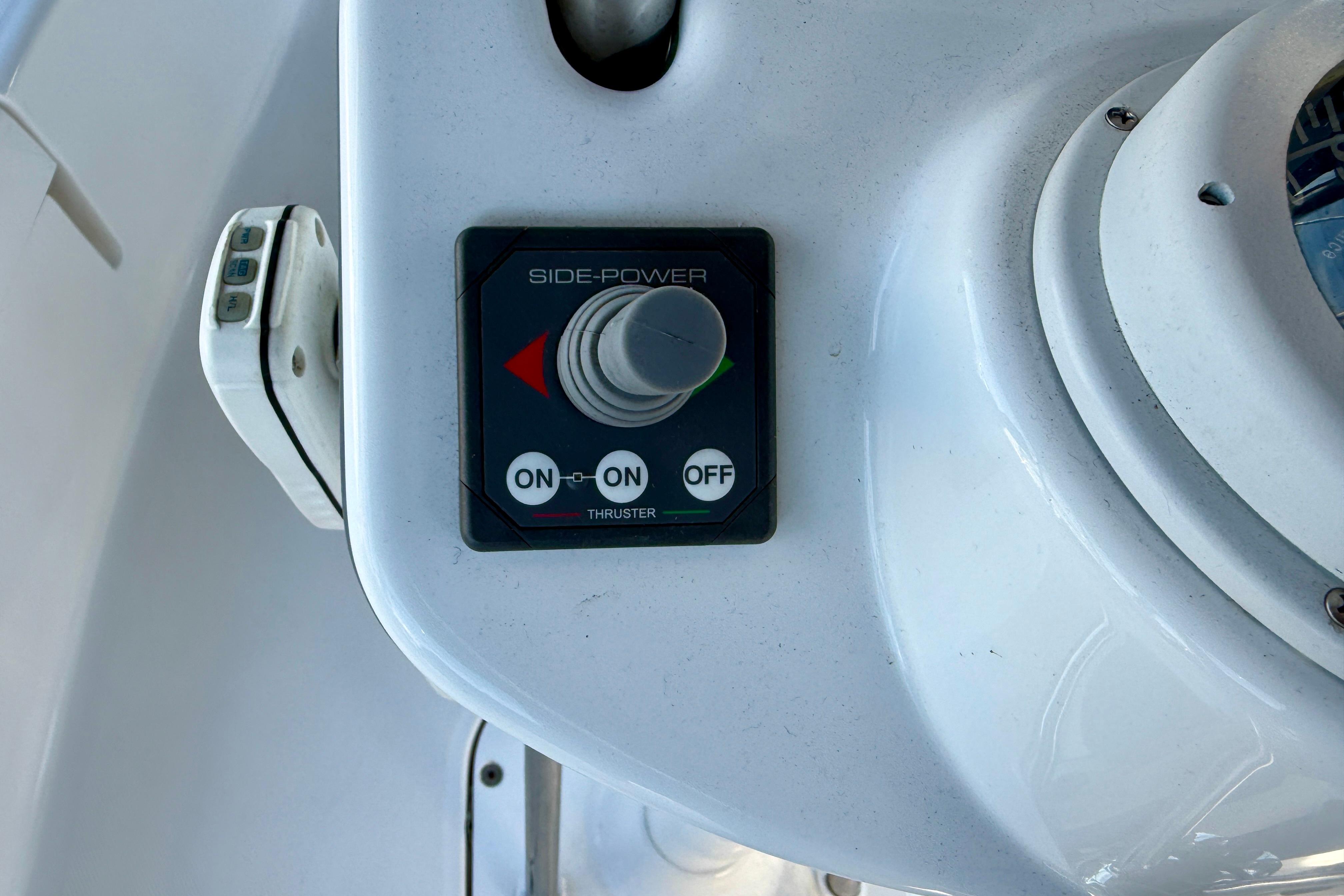 Control panel of 2007 Hunter 44 Deck Salon boat with Side-Power thruster.