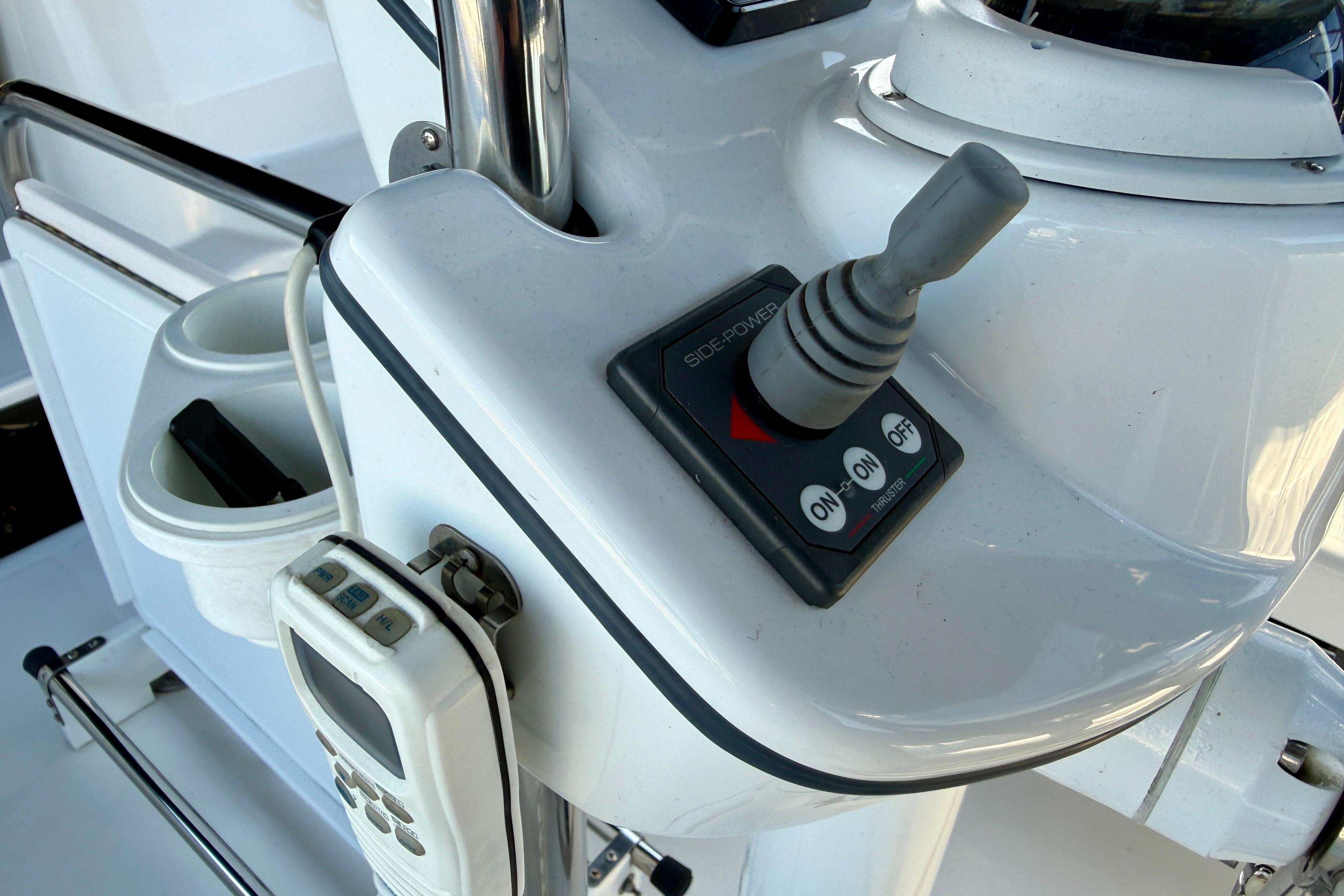 Control panel of 2007 Hunter 44 Deck Salon yacht with joystick and remote.