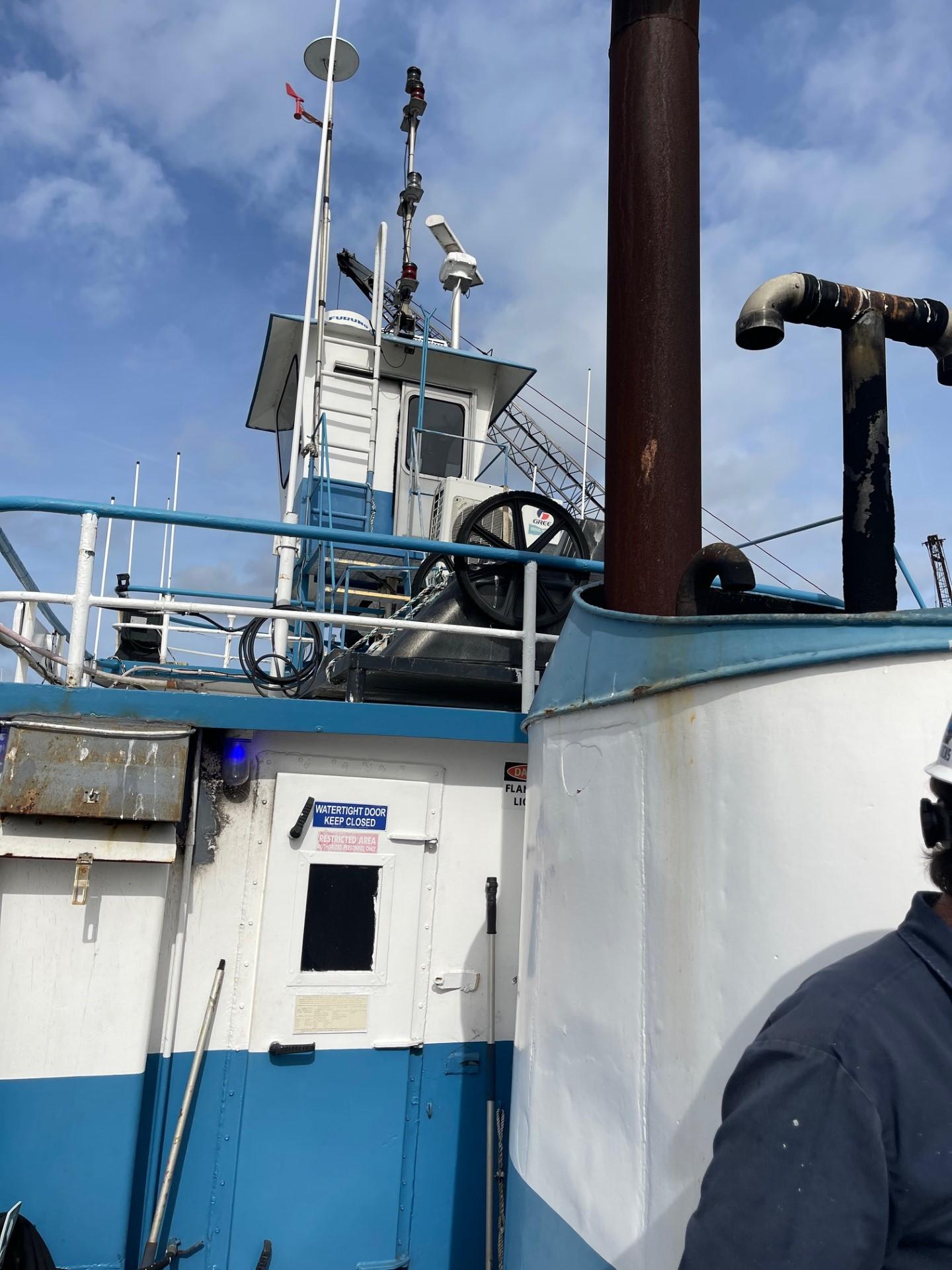 Commercial-Model Bow Tug 1961 -FL-US-1961 Commercial Model Bow Tugboat with blue and white exterior under a cloudy sky.-9787034 | Thumbnail