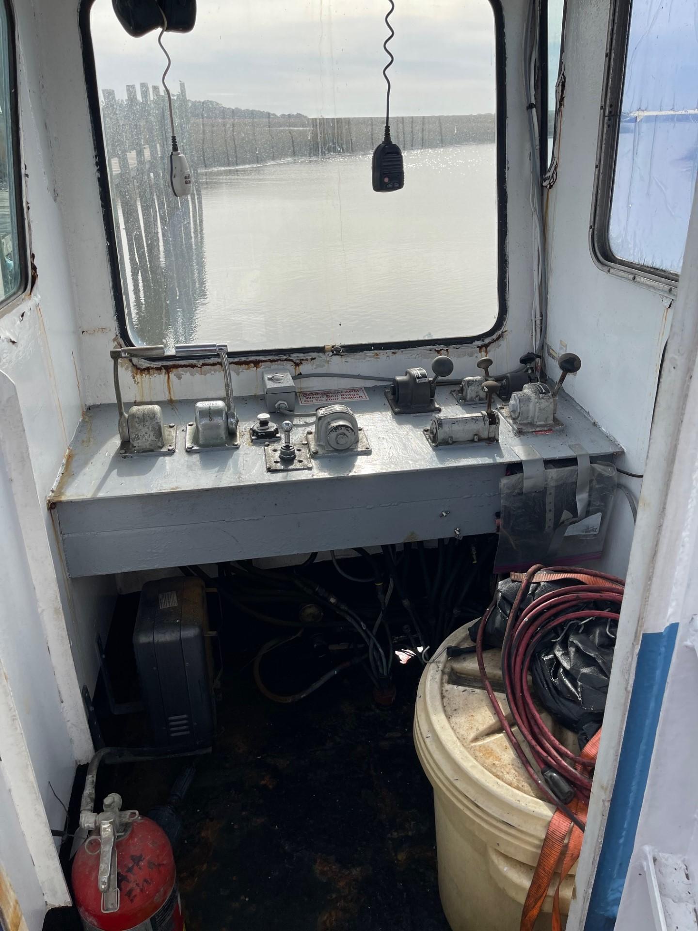 Commercial-Model Bow Tug 1961 -FL-US-Interior of a 1961 Commercial Model Bow Tug with control panel and equipment.-9787034 | Thumbnail