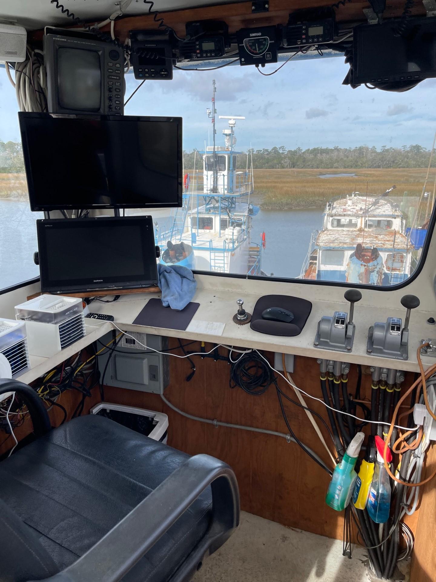 Commercial-Model Bow Tug 1961 -FL-US-Interior of a 1961 Commercial Model Bow Tugboat with control panel and monitors.-9787034 | Thumbnail