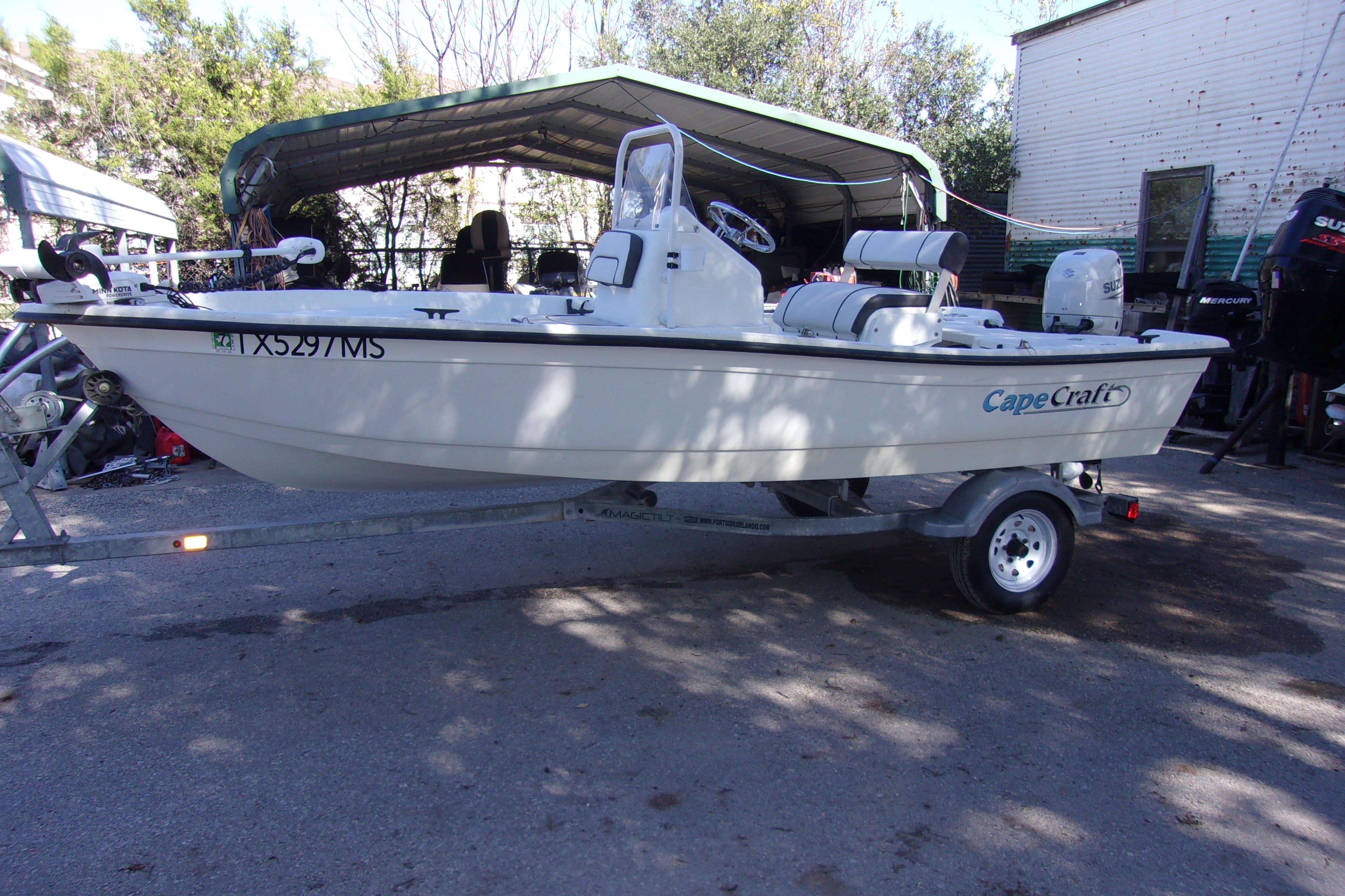 2021 Clearwater Sport Fishing Cape Craft 166CC boat on trailer, parked outdoors.