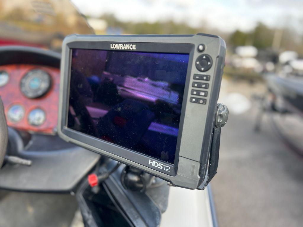 Lowrance HDS12 fishfinder on 1999 Triton TR20 boat dashboard.