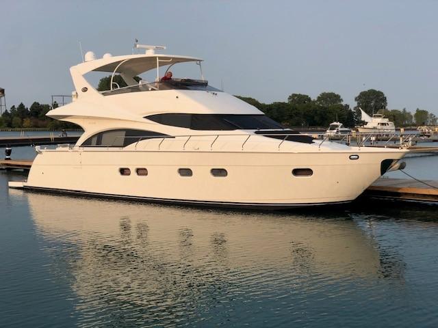 Marquis-59 2004 -IL-US-2004 Marquis 59 yacht docked in a serene marina setting.-9798156