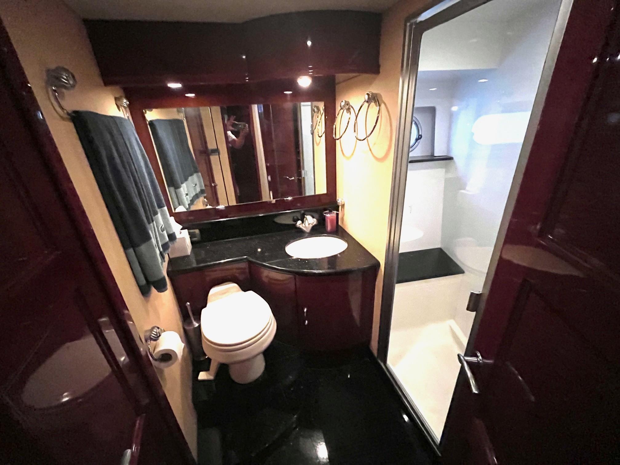 Marquis-59 2004 -IL-US-Luxurious bathroom in 2004 Marquis 59 yacht with modern fixtures and elegant design.-9798156 | Thumbnail
