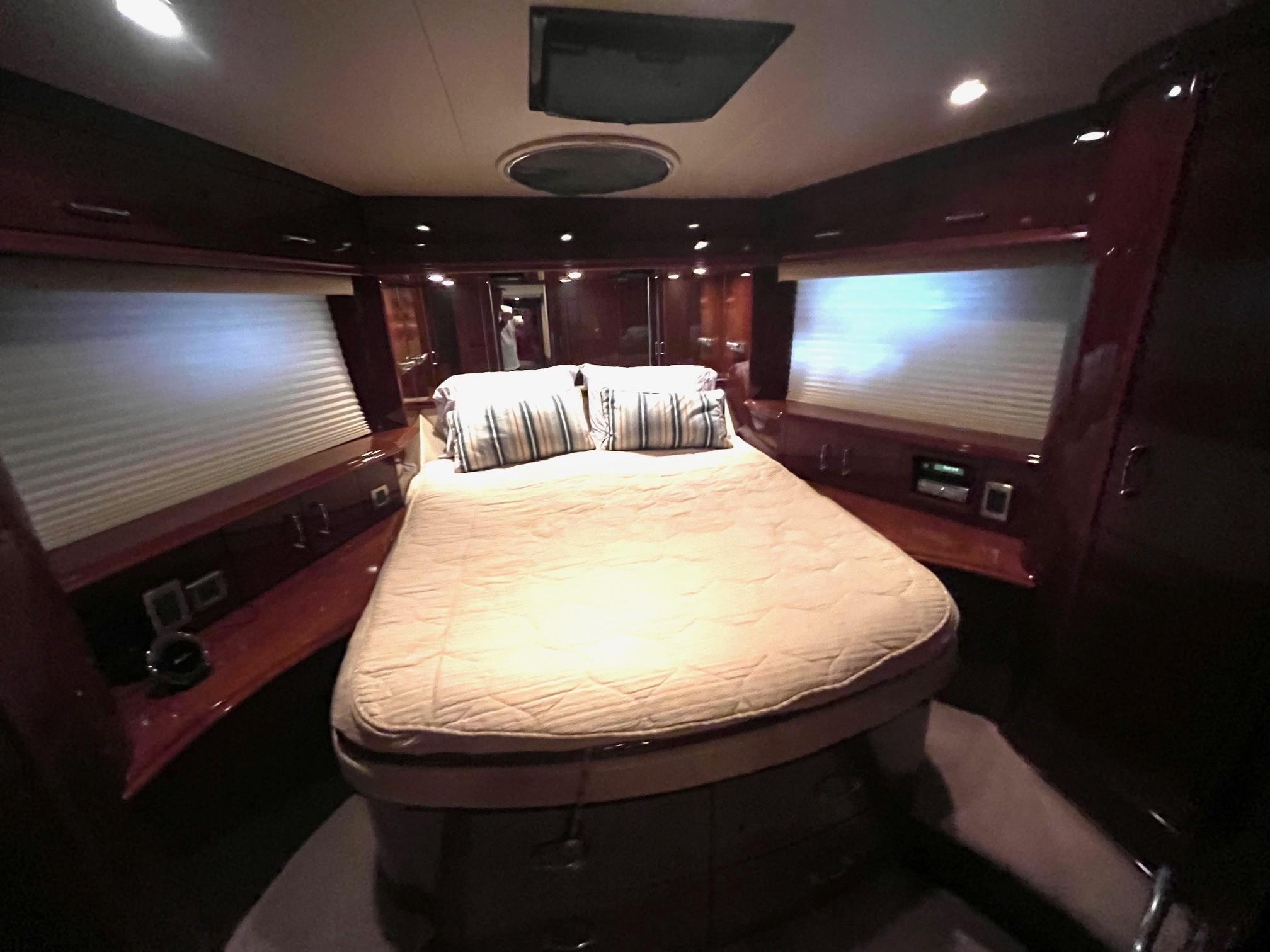 Marquis-59 2004 -IL-US-Luxurious bedroom interior of a 2004 Marquis 59 yacht with elegant wood finishes.-9798156 | Thumbnail