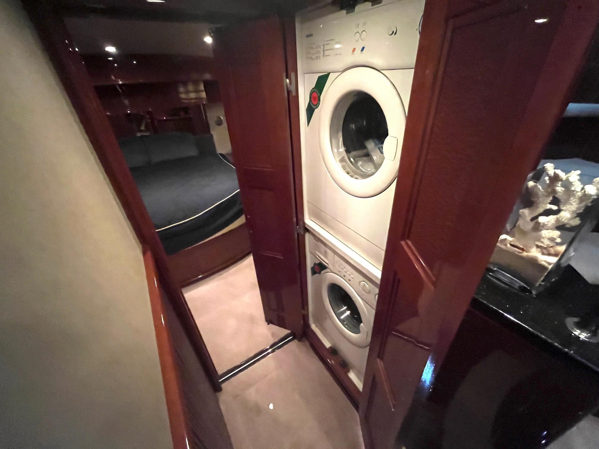 Marquis-59 2004 -IL-US-Laundry area inside 2004 Marquis 59 yacht with washer and dryer.-9798156 | Thumbnail