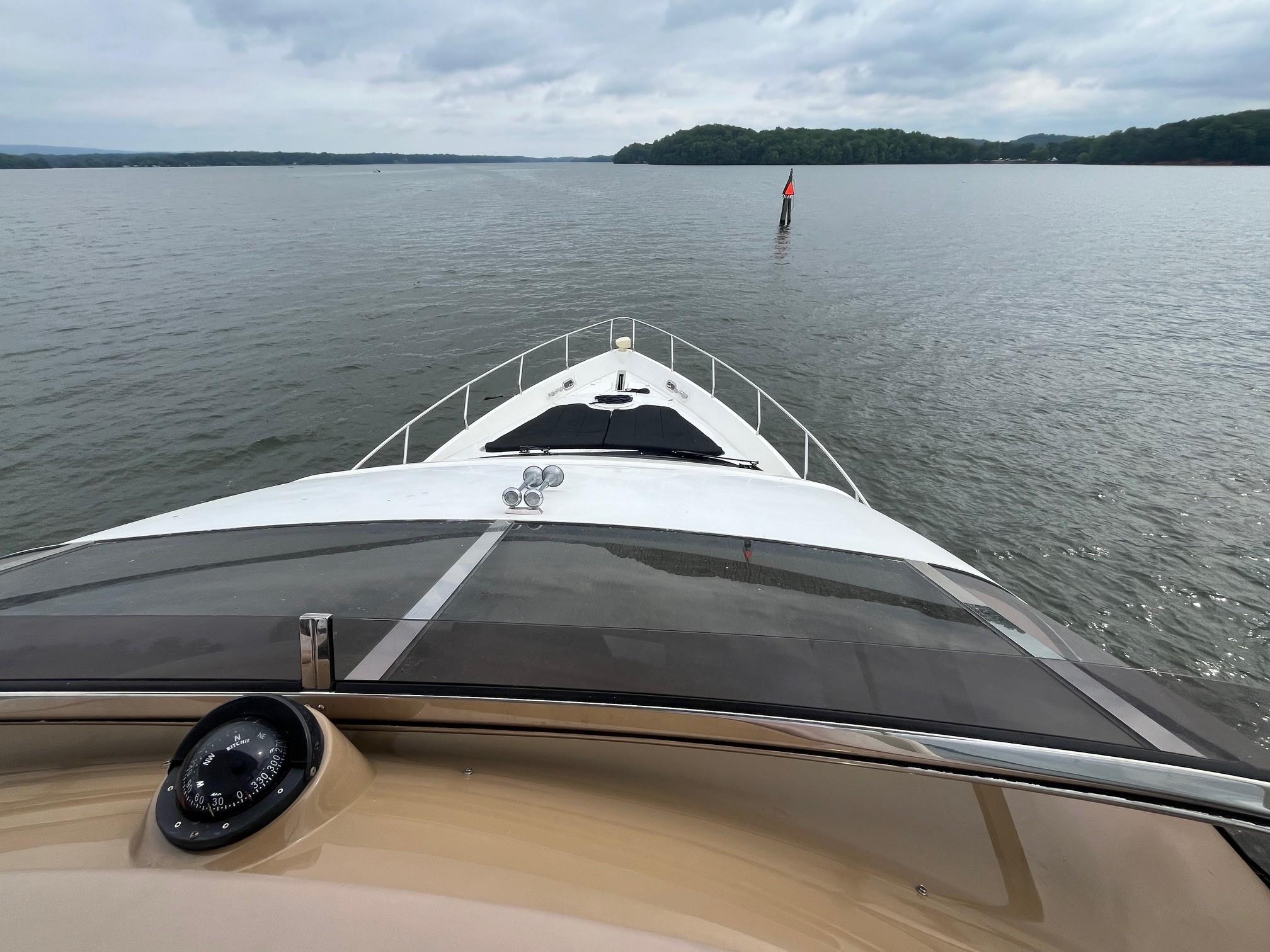 Marquis-59 2004 -IL-US-Bow view of 2004 Marquis 59 yacht cruising on a calm lake.-9798156 | Thumbnail