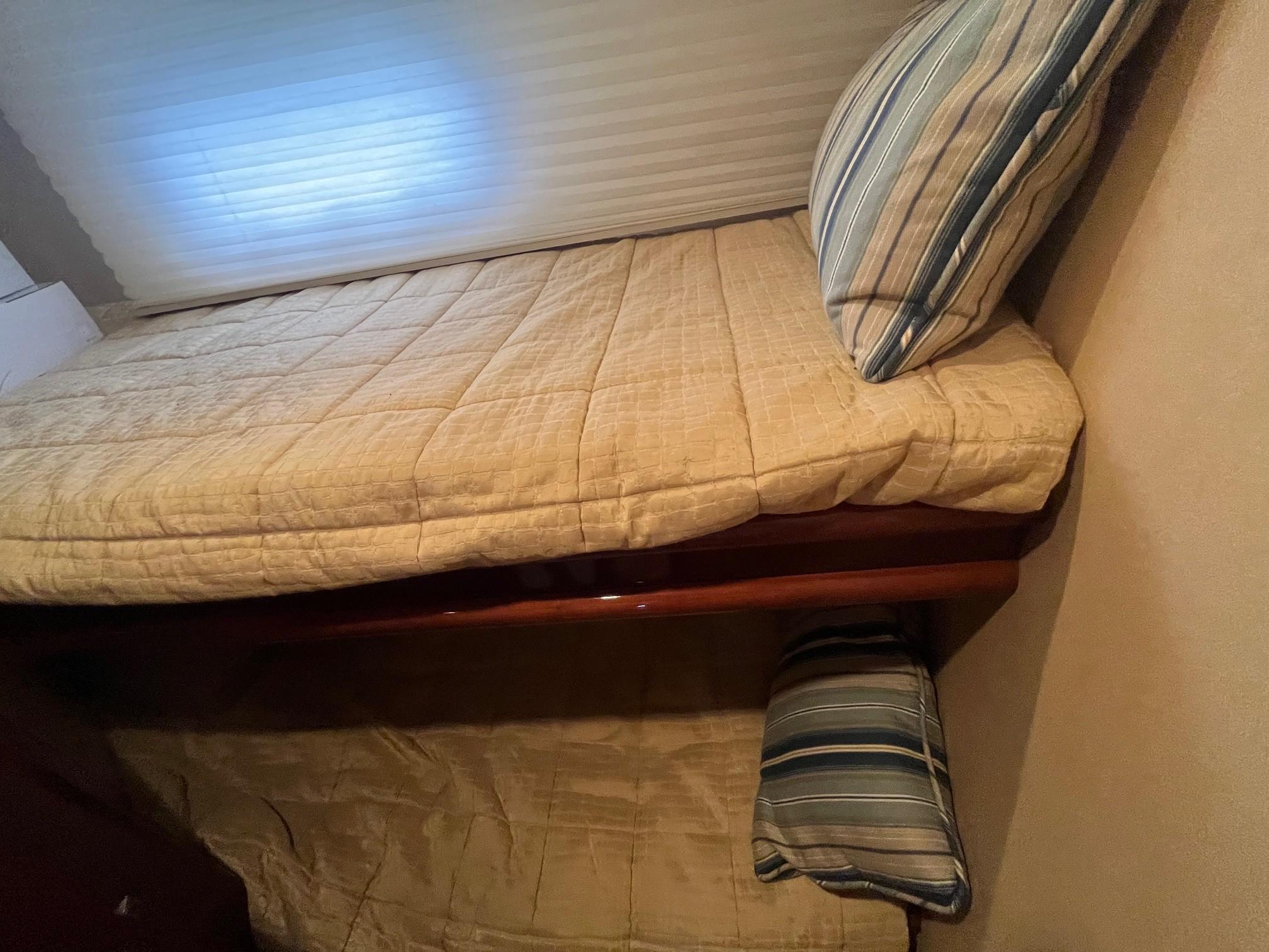 Marquis-59 2004 -IL-US-Bunk beds with striped pillows in a 2004 Marquis 59 interior.-9798156 | Thumbnail