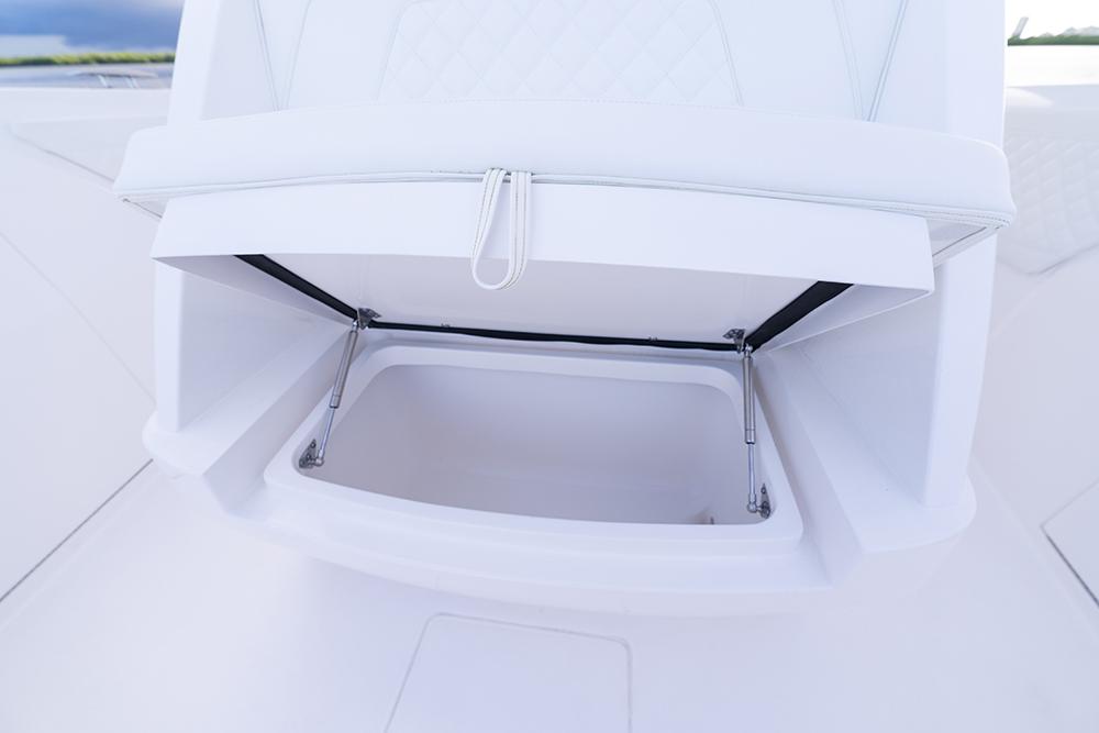 Cooler under fwd seating