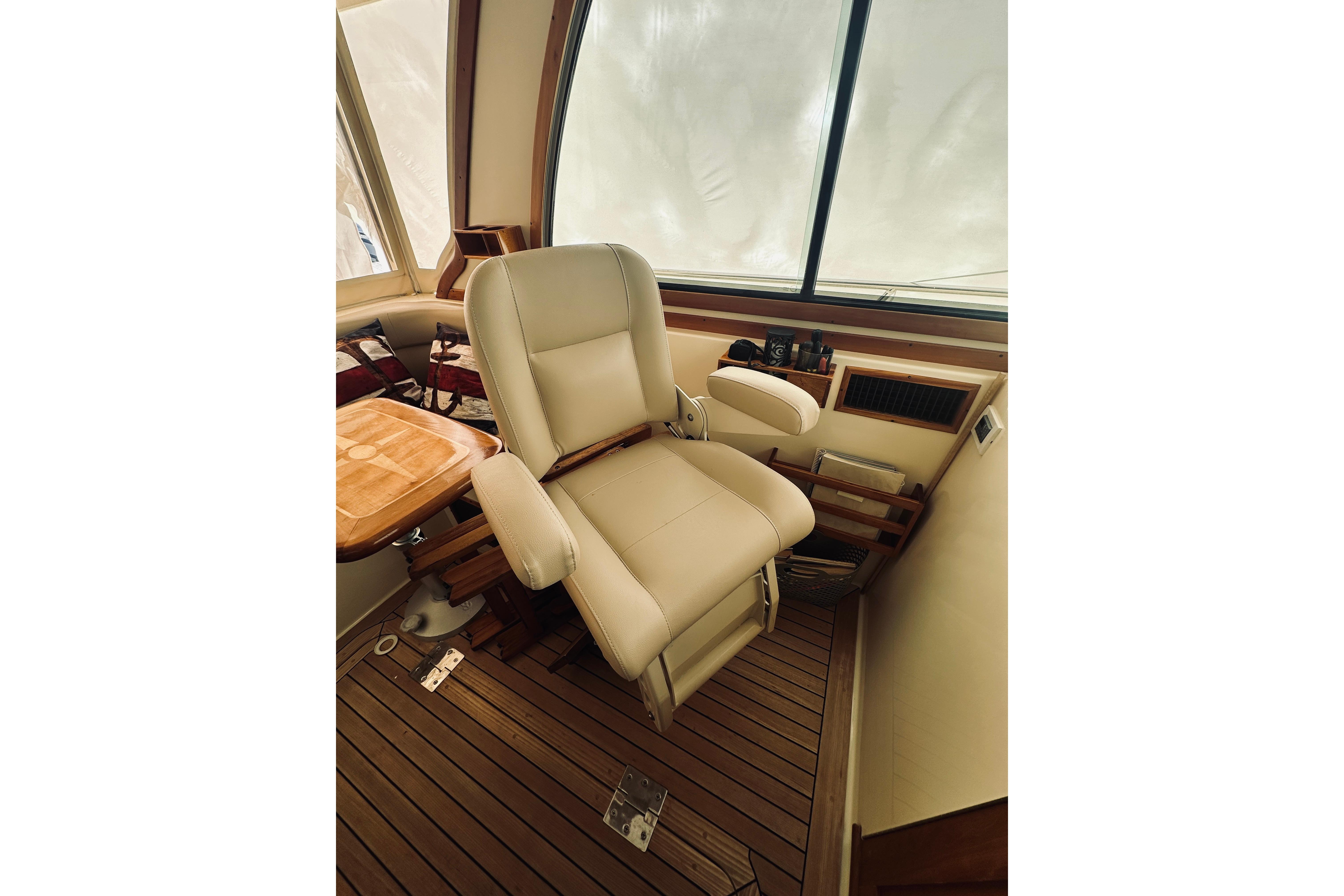 Captainu0027s chair in 2008 Sabre 38 Hard Top Express yacht interior.