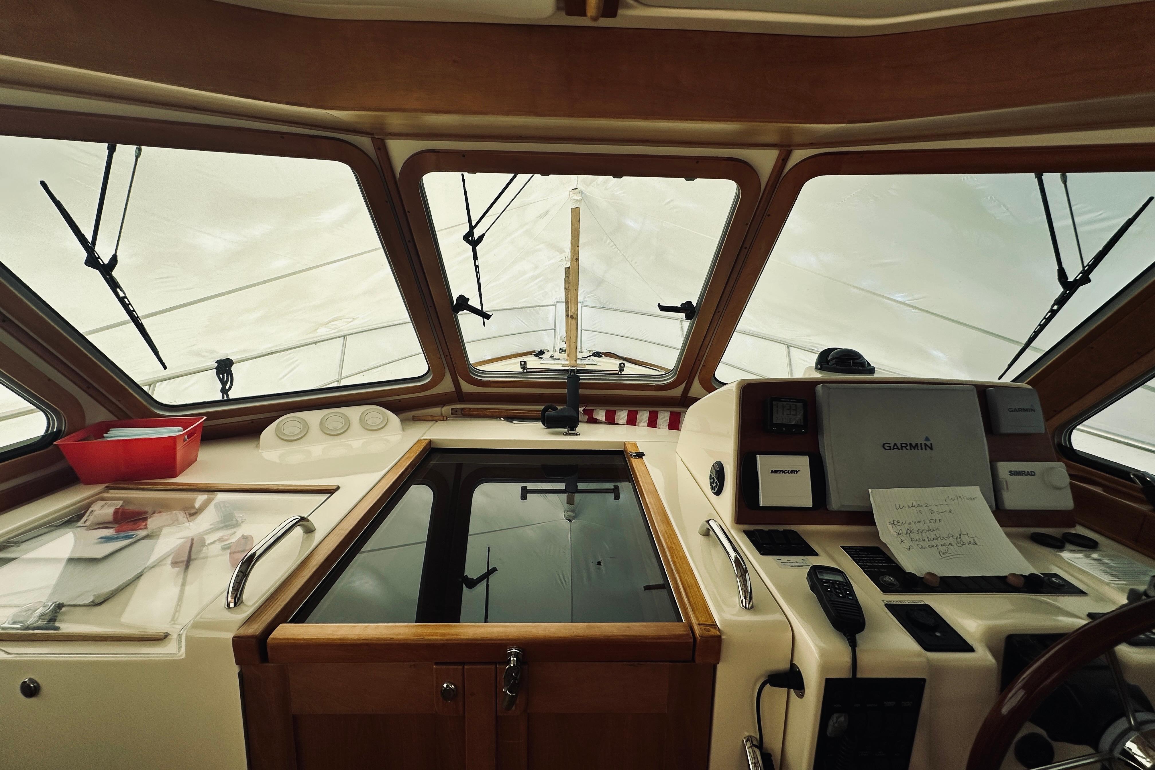 2008 Sabre 38 Hard Top Express helm with Garmin navigation system and wooden accents.
