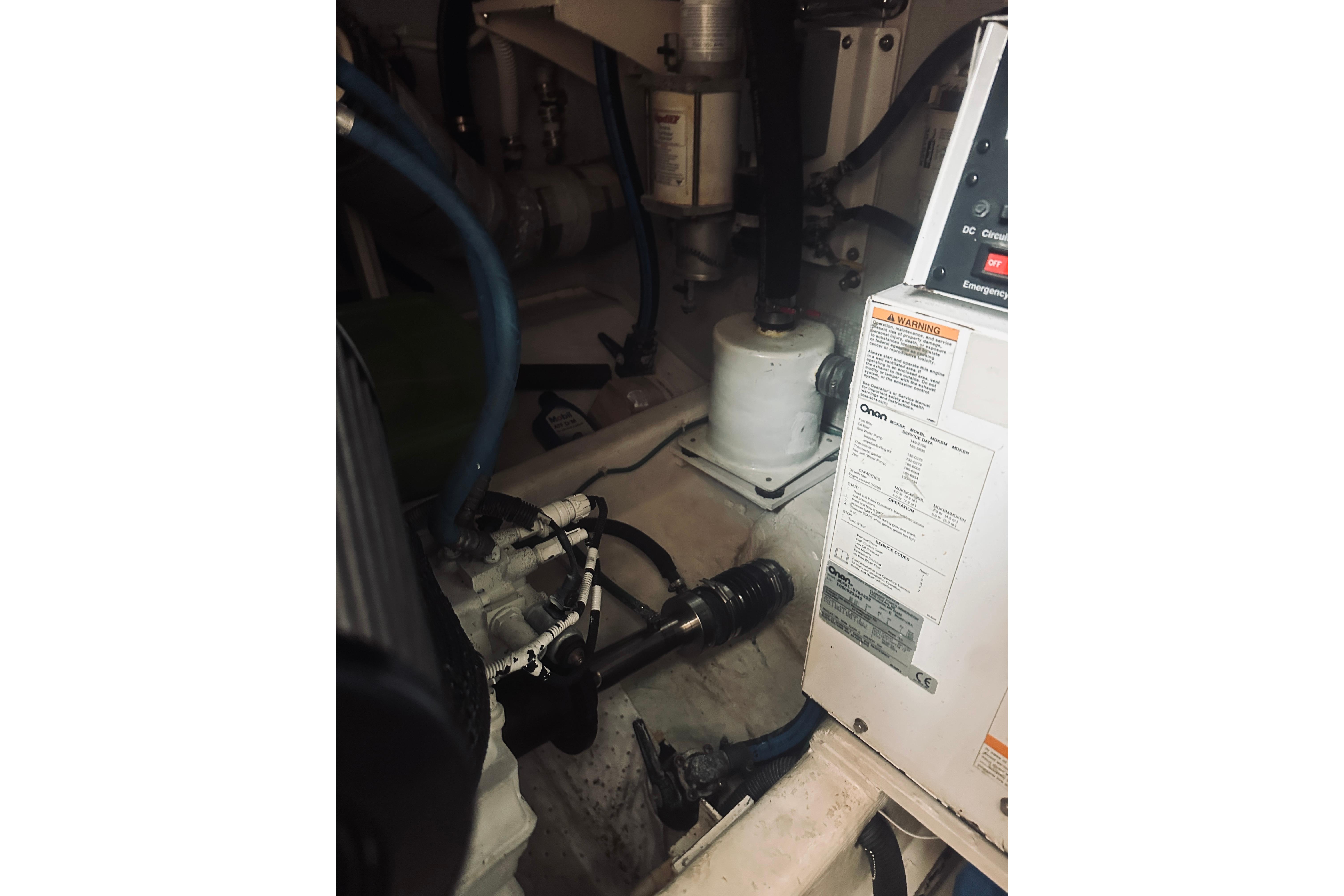 Engine room of 2008 Sabre 38 Hard Top Express with visible machinery and components.