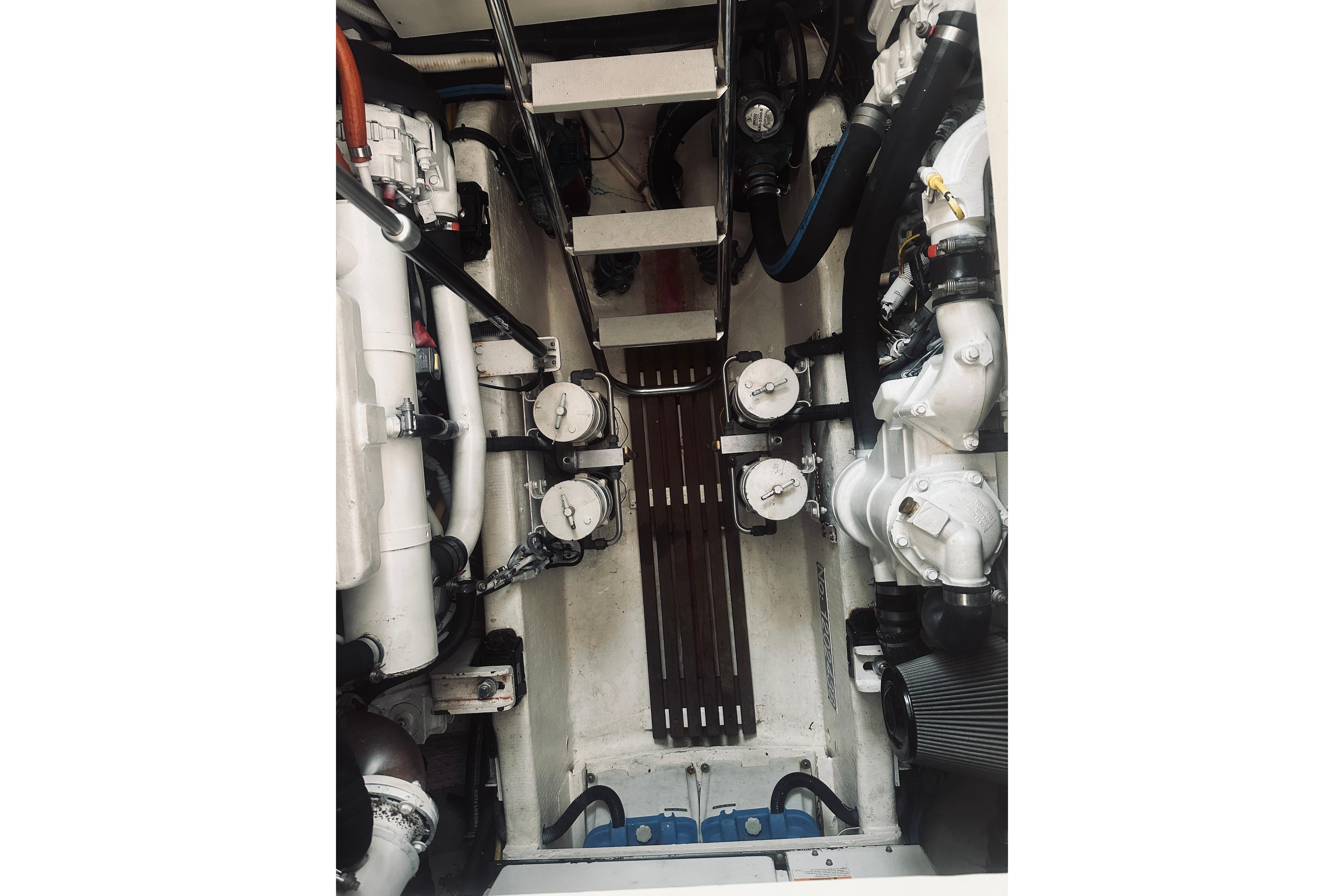 Engine room of 2008 Sabre 38 Hard Top Express, showcasing mechanical components.