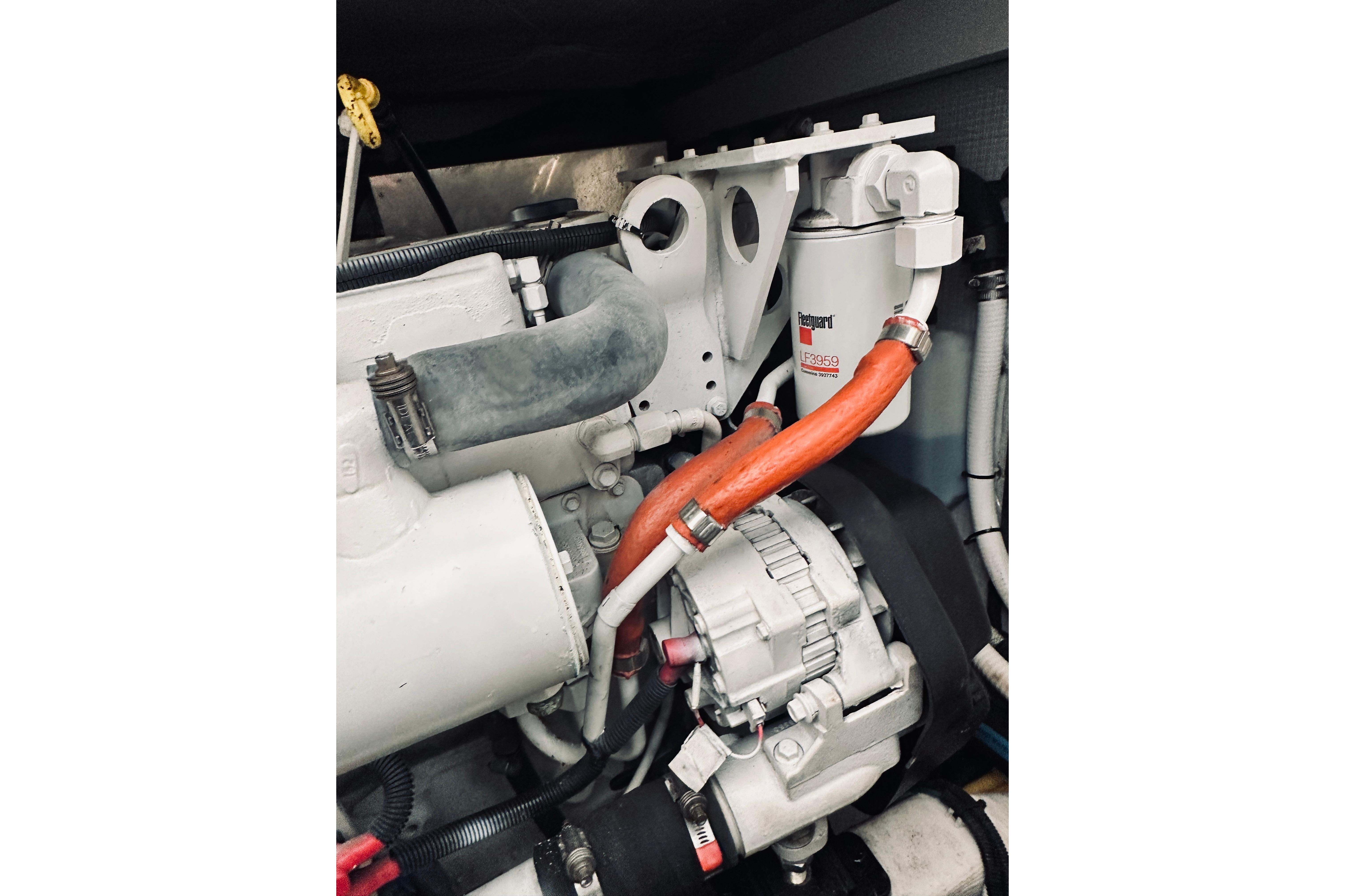 Engine compartment of 2008 Sabre 38 Hard Top Express with visible components and hoses.