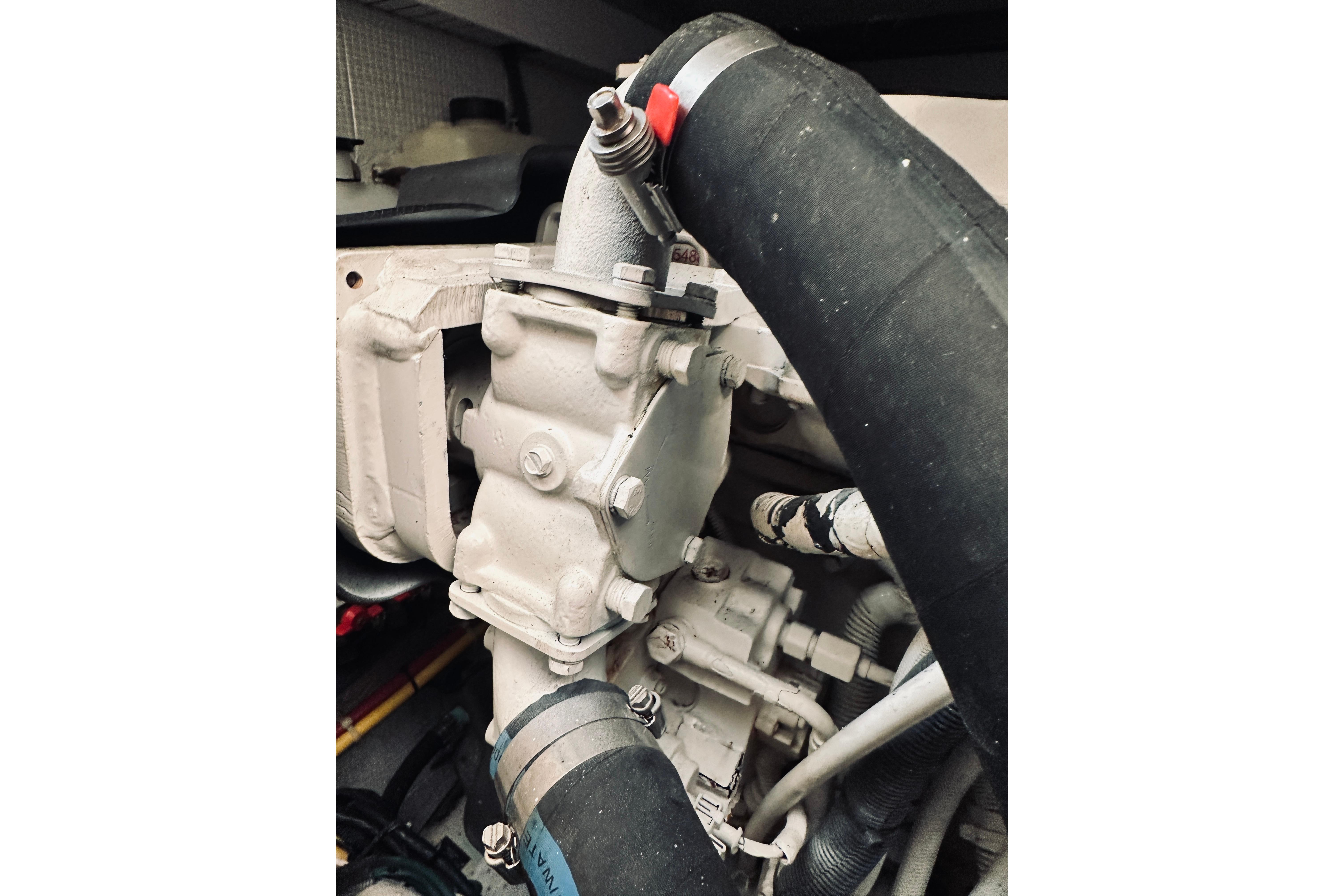 Engine component of 2008 Sabre 38 Hard Top Express with hoses and fittings.