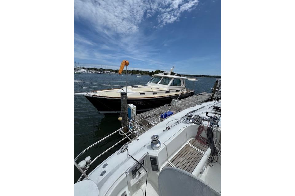 2008 Sabre 38 Hard Top Express yacht docked on a sunny day.