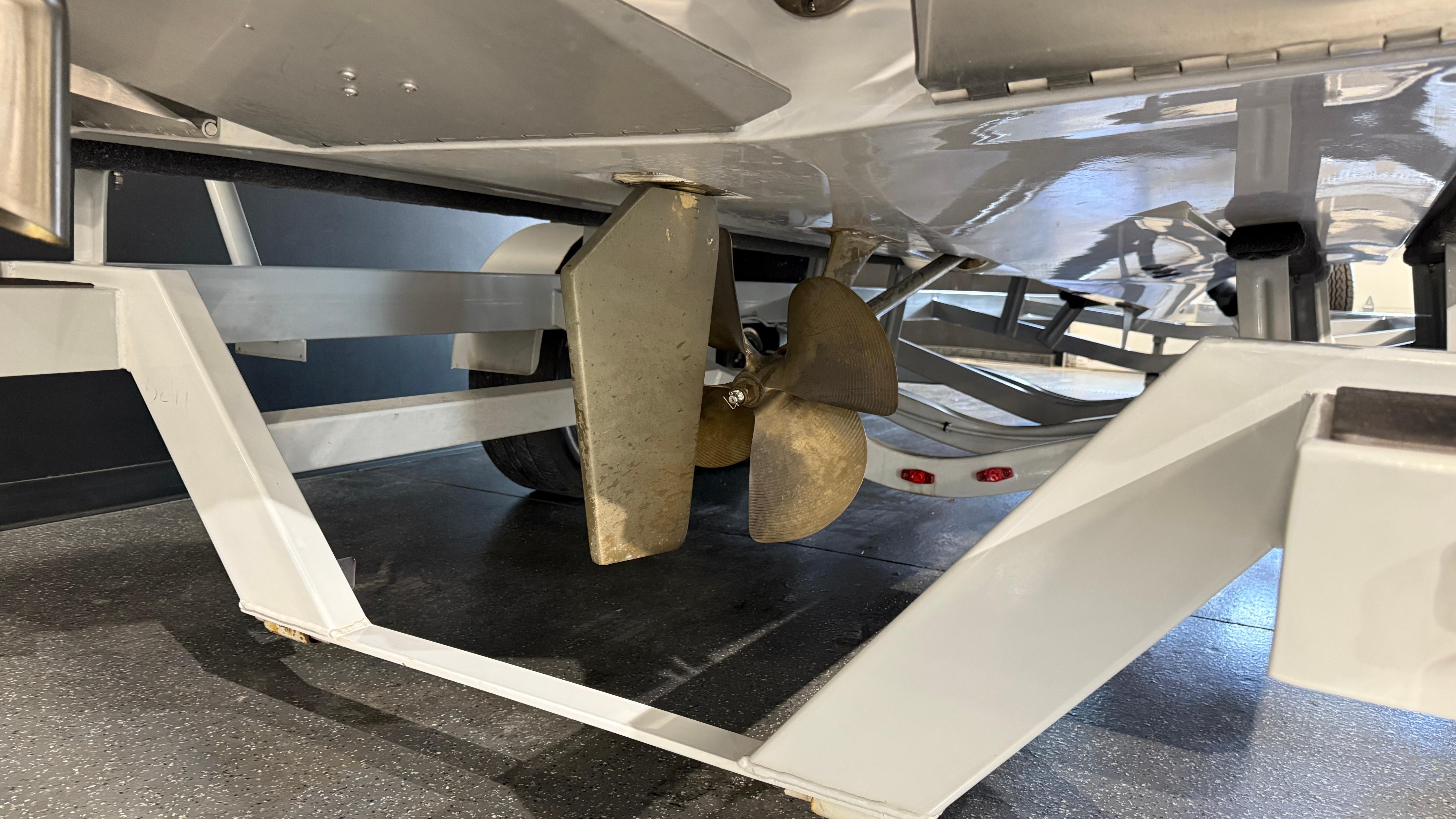 2022 Tigé 23ZX boat propeller and trailer detail.