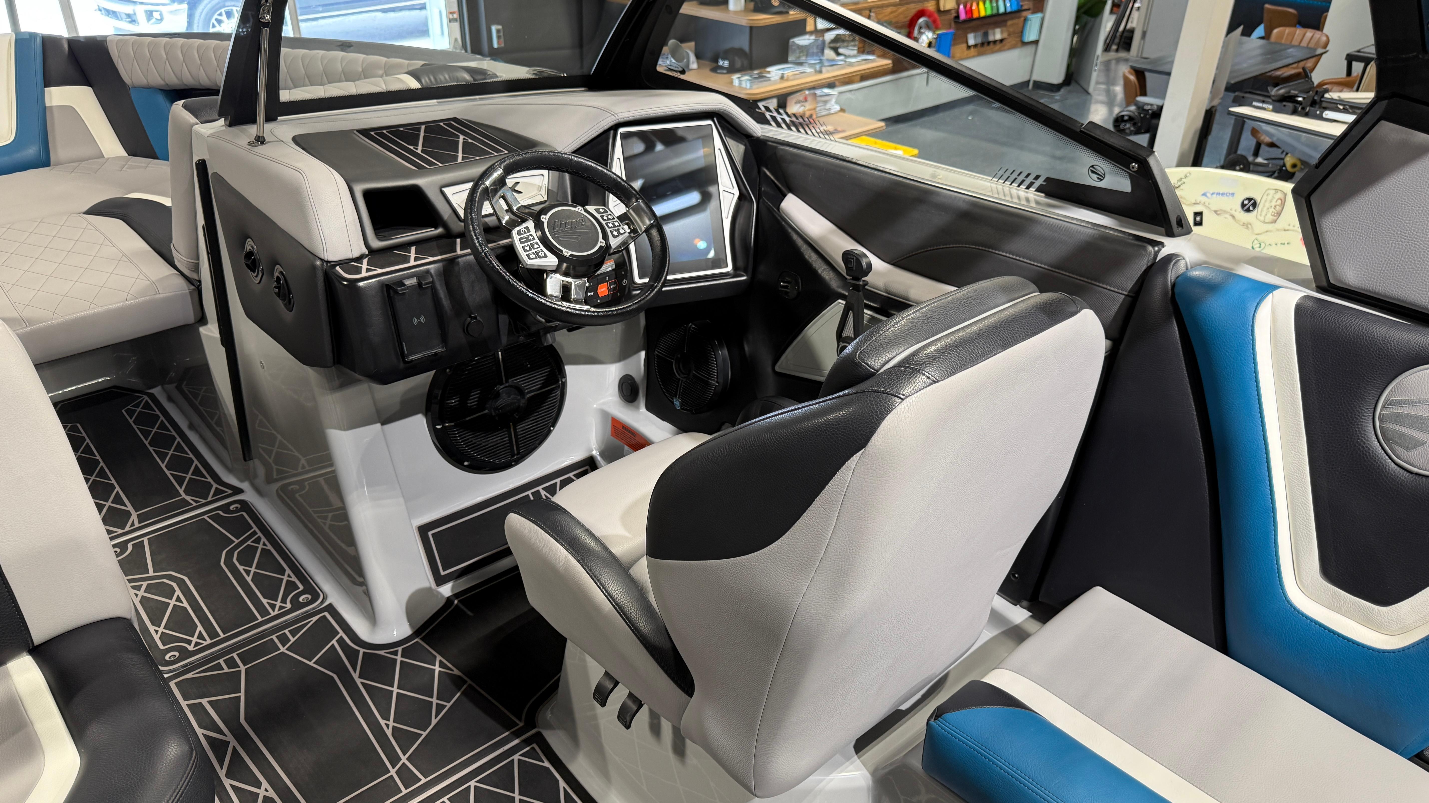 2022 Tigé 23ZX boat interior with modern dashboard and seating.