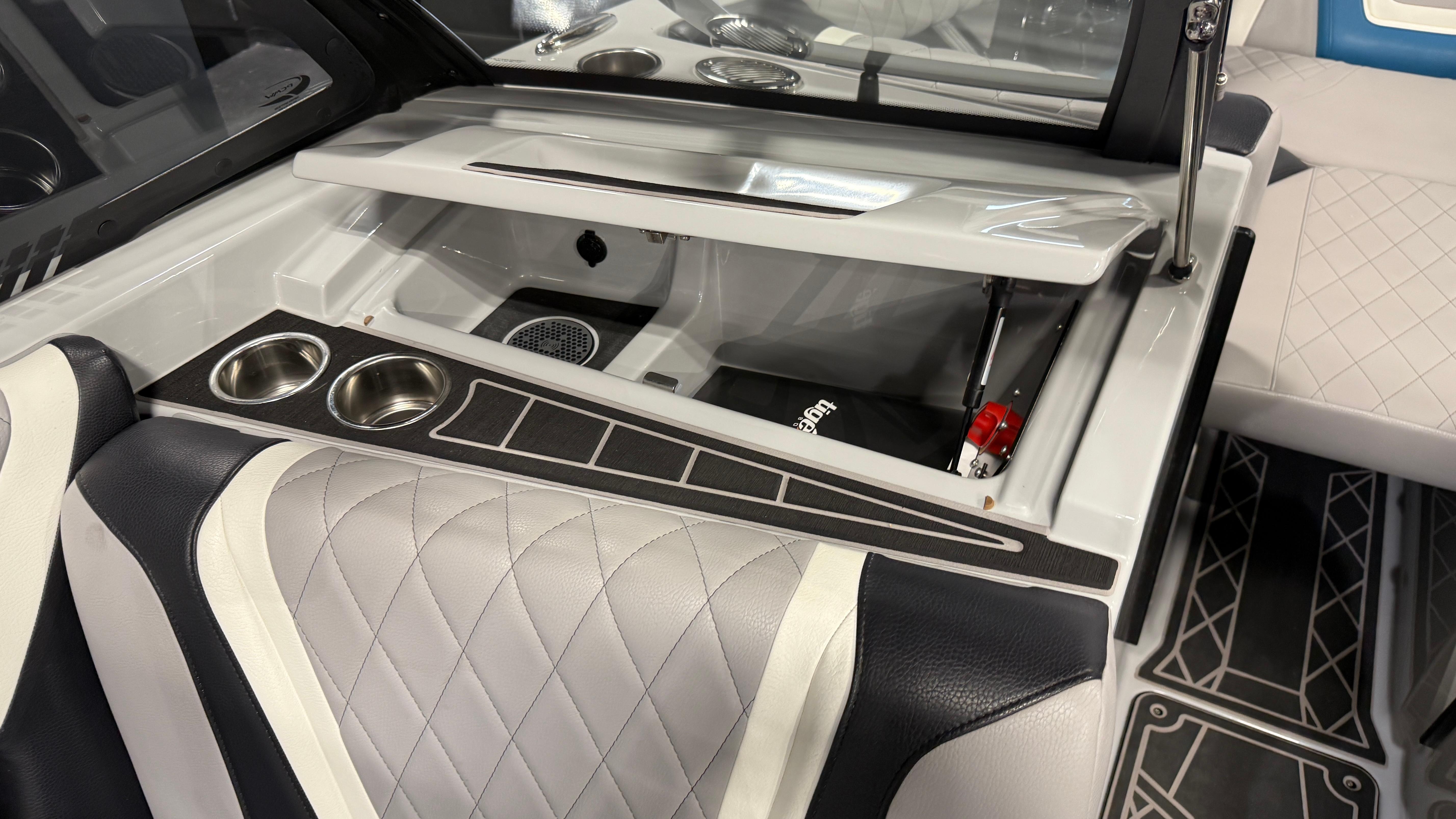 2022 Tigé 23ZX boat interior with quilted seats and cup holders.
