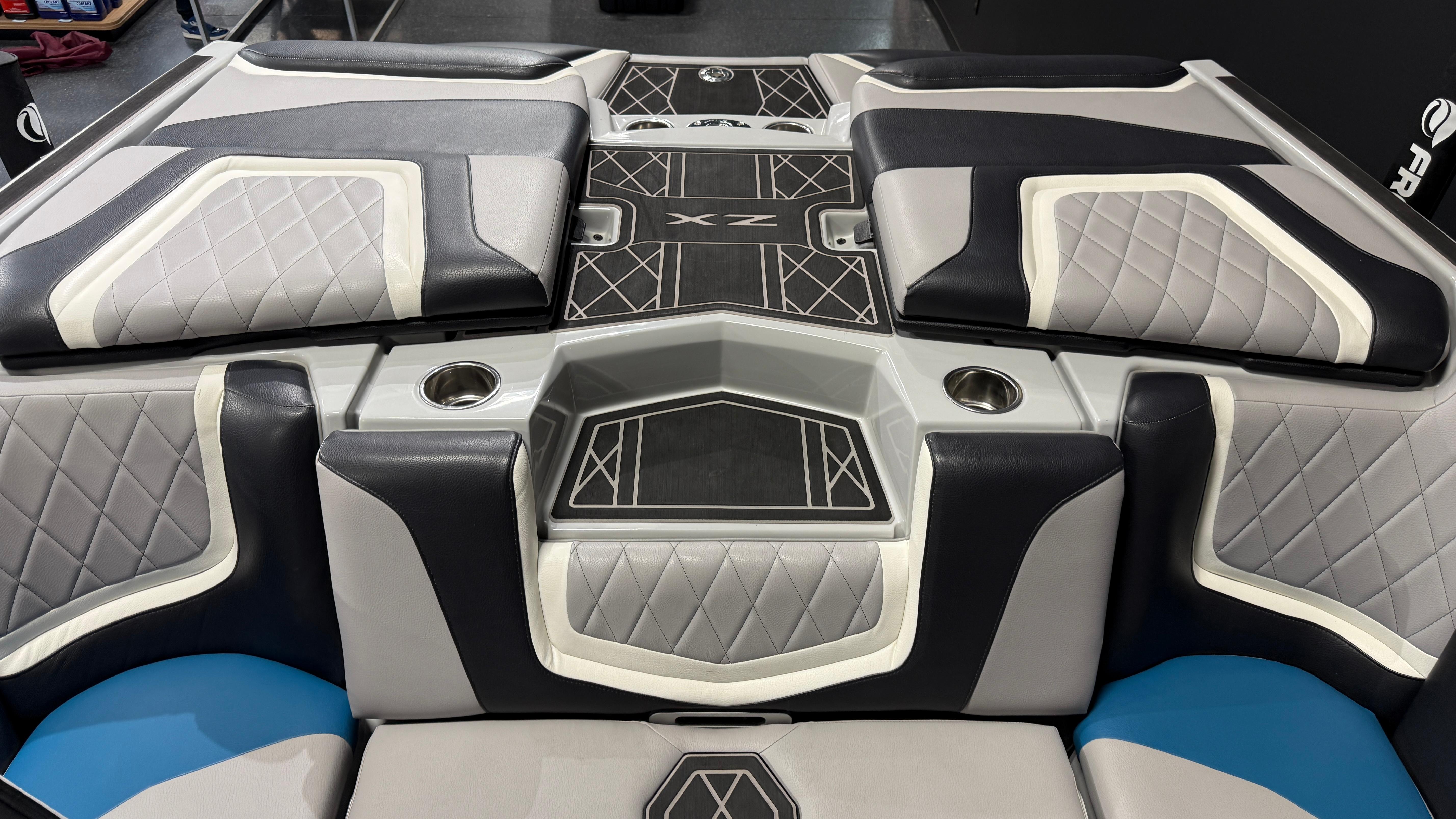 2022 Tigé 23ZX boat interior with stylish seating and cup holders.