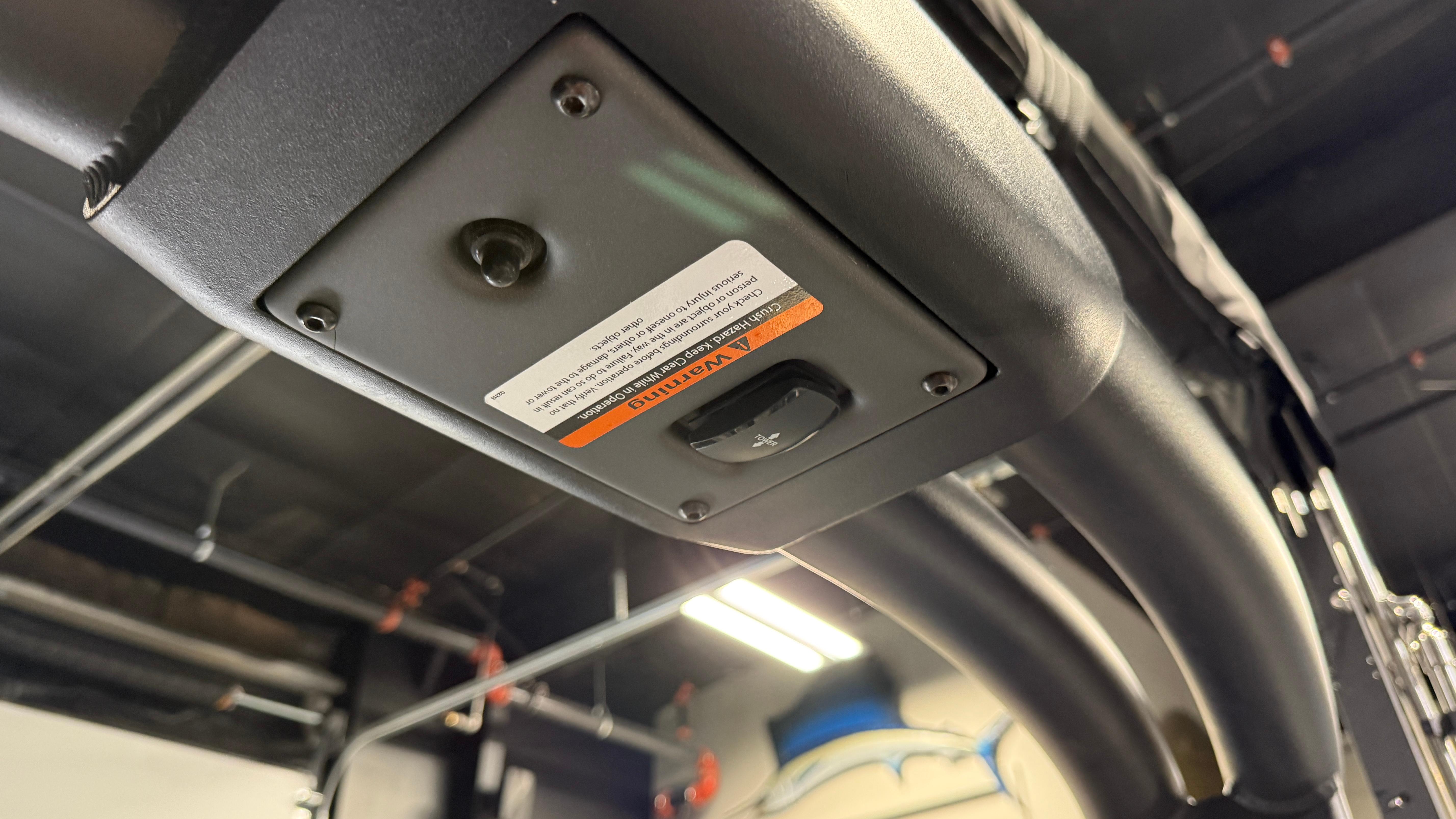 Close-up of 2022 Tigé 23ZX boat control panel under a canopy.