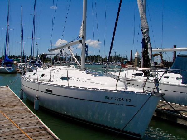 2001 Beneteau 331 sailboat docked in marina.
