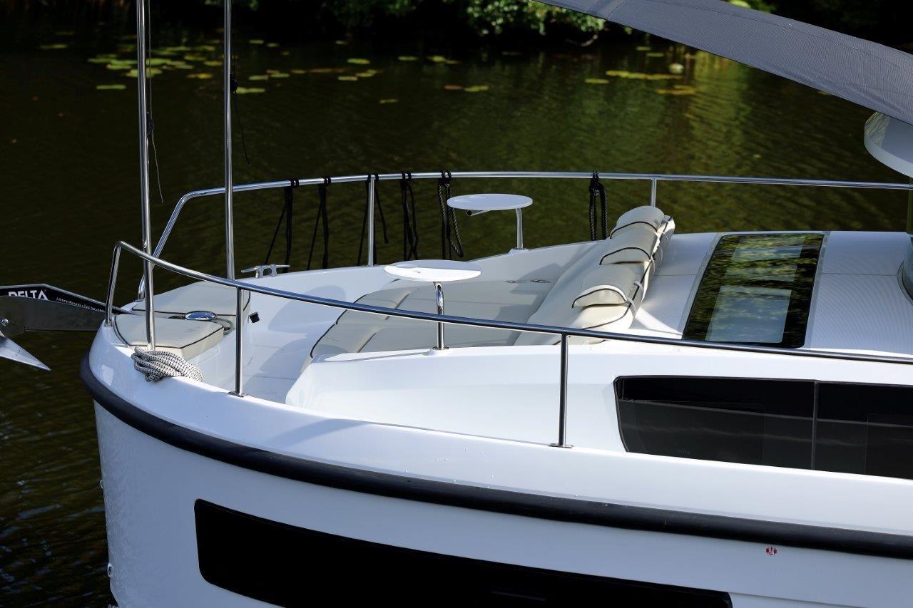2025 Delphia D11 SEDAN yacht with sleek design and modern deck features.