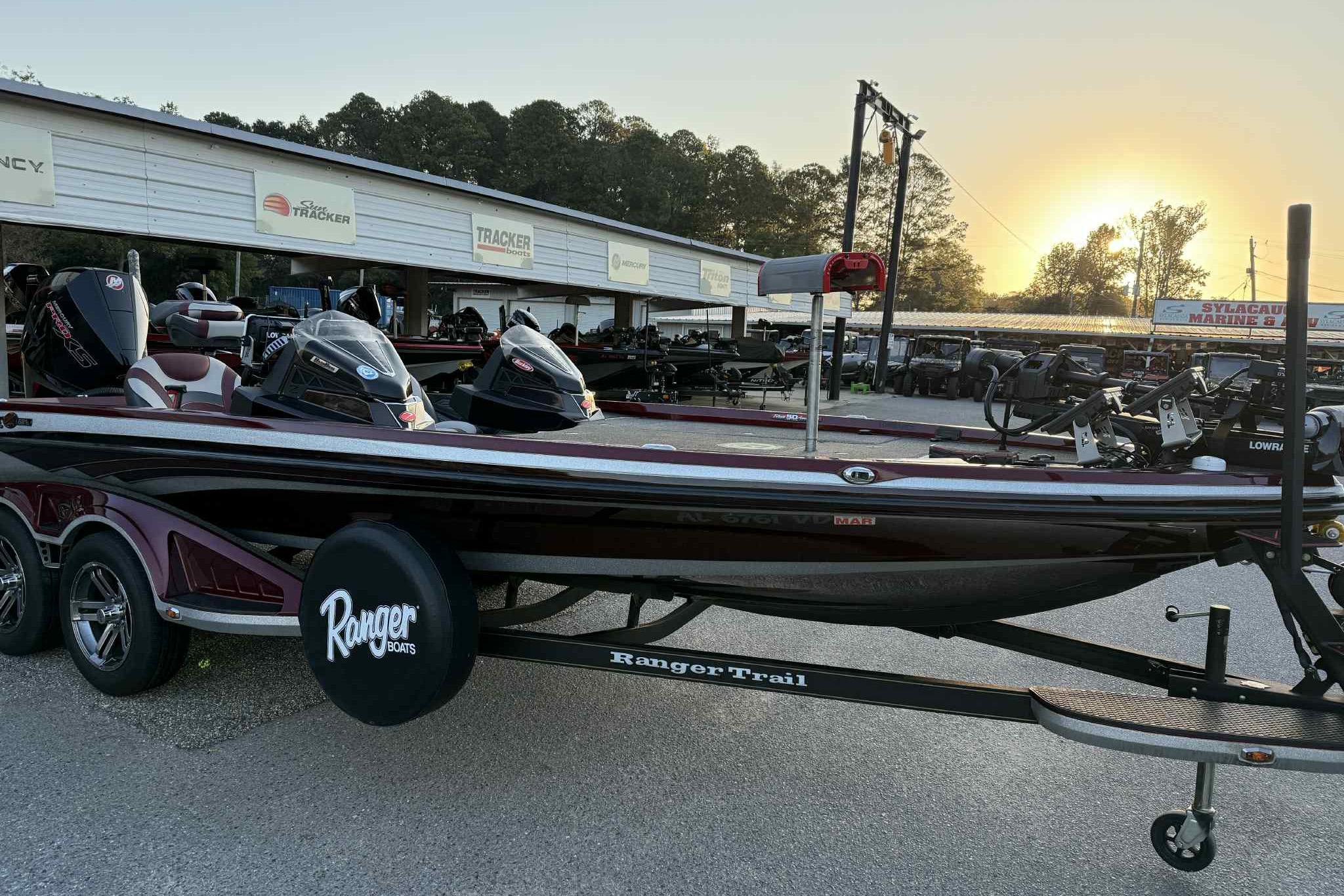 2018 Ranger Z520L boat on trailer at sunset, dealership background.