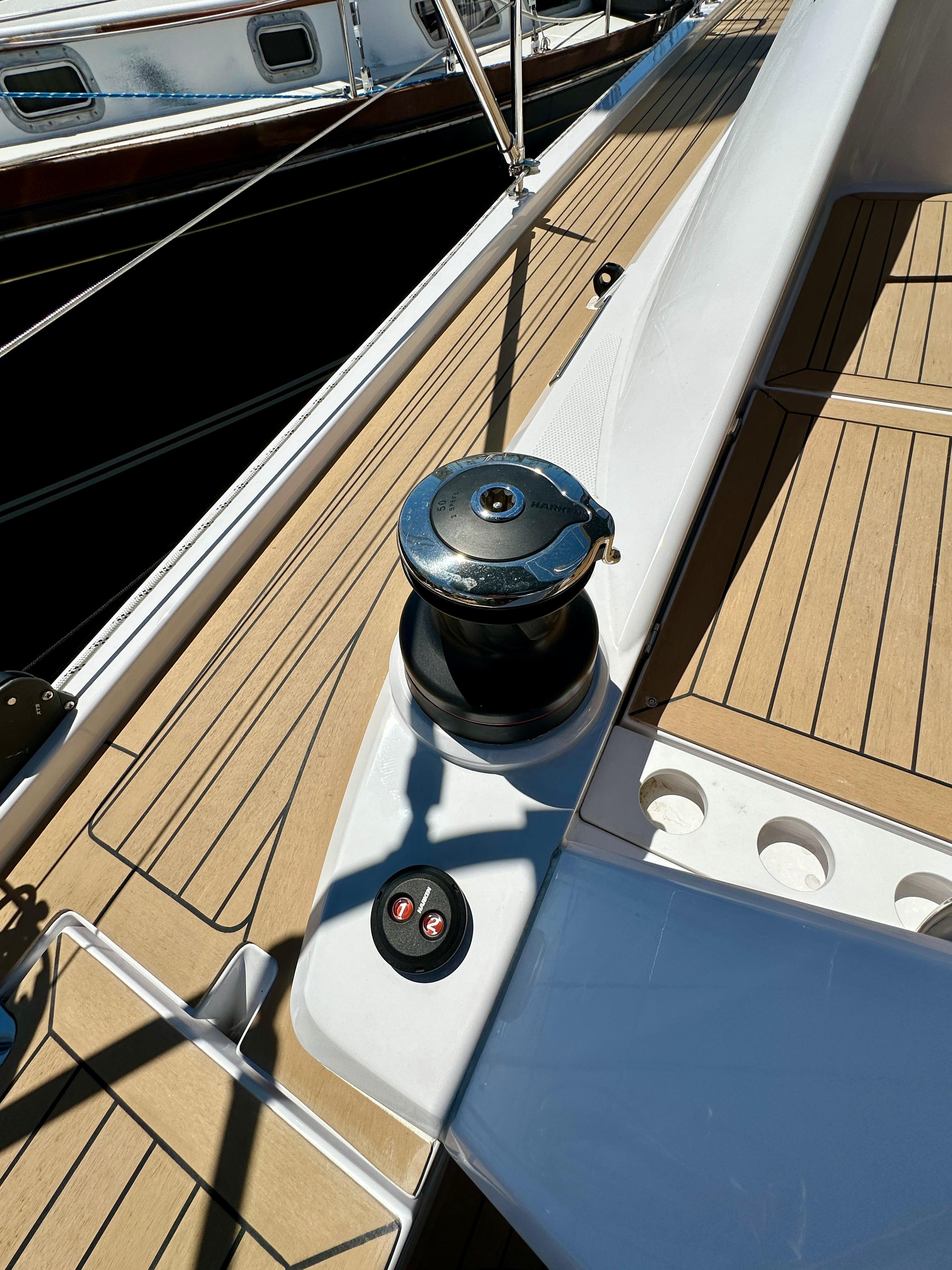 Elan-Impression 43 2024-Hard Loaded CT-US-2024 Elan Impression 43 yacht deck with winch and teak flooring.-9178291 | Thumbnail