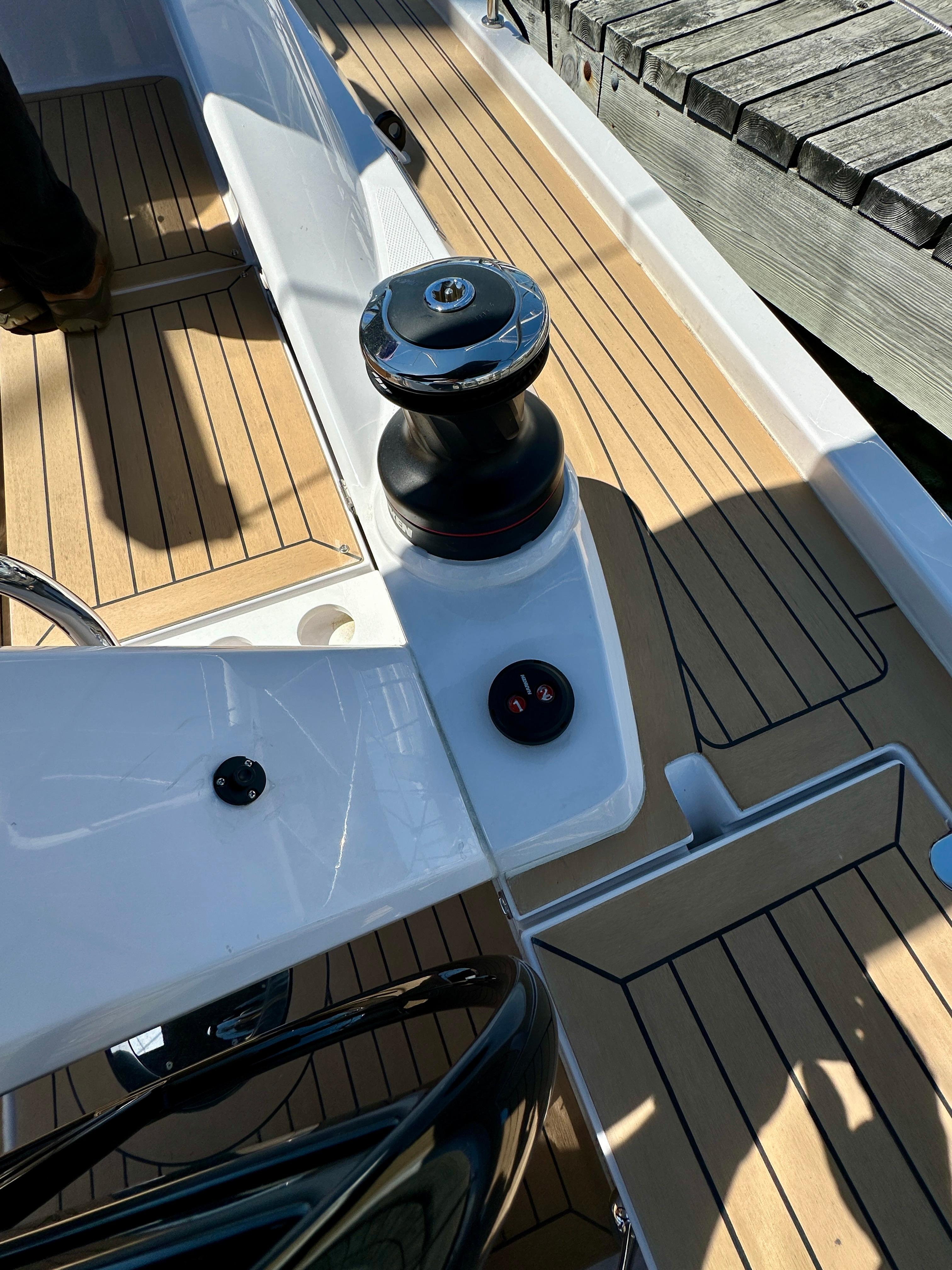 Elan-Impression 43 2024-Hard Loaded CT-US-2024 Elan Impression 43 yacht deck with winch and teak flooring.-9178291 | Thumbnail