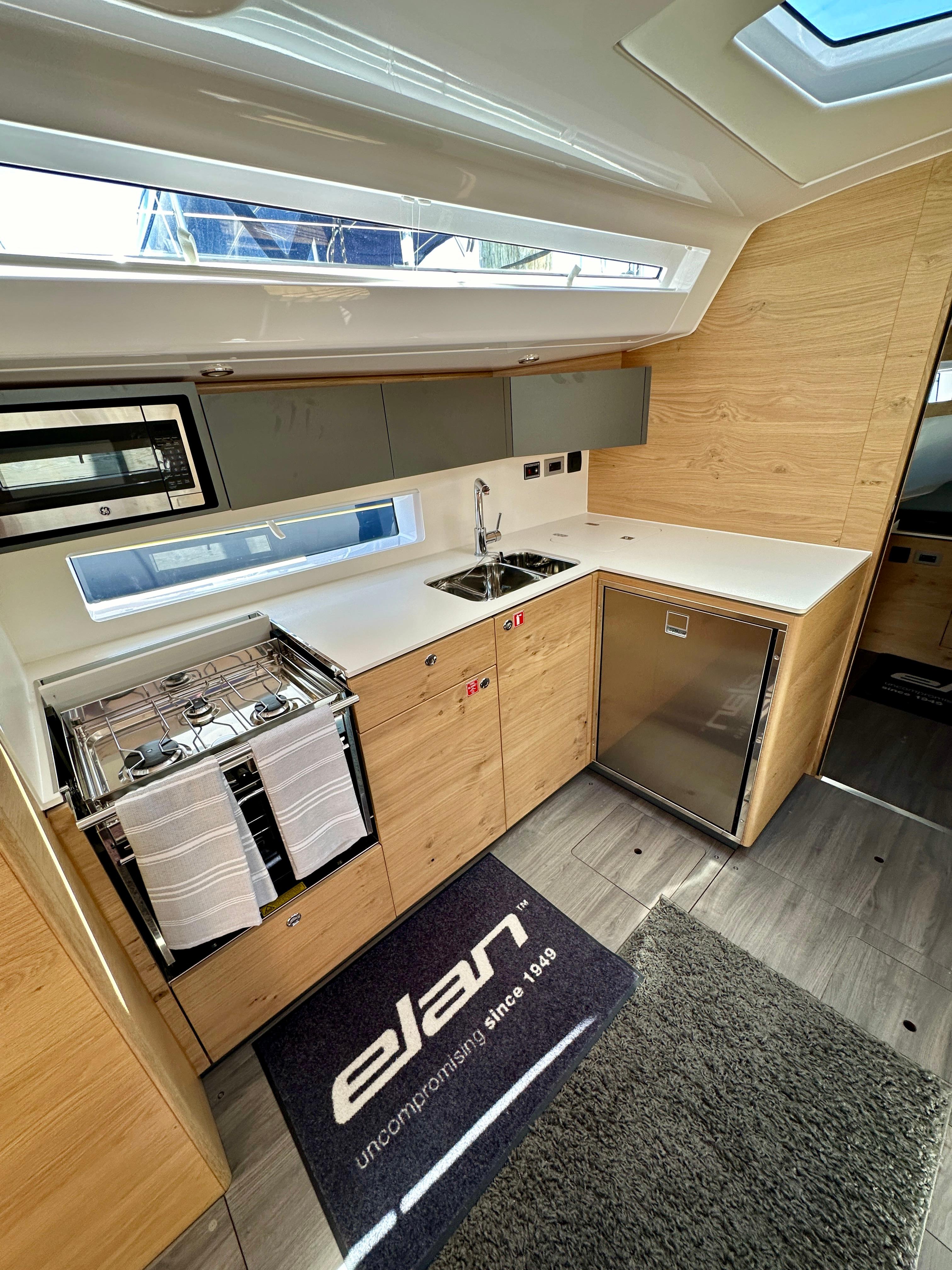 Elan-Impression 43 2024-Hard Loaded CT-US-Modern kitchen interior of 2024 Elan Impression 43 yacht with sleek design and appliances.-9178291 | Thumbnail