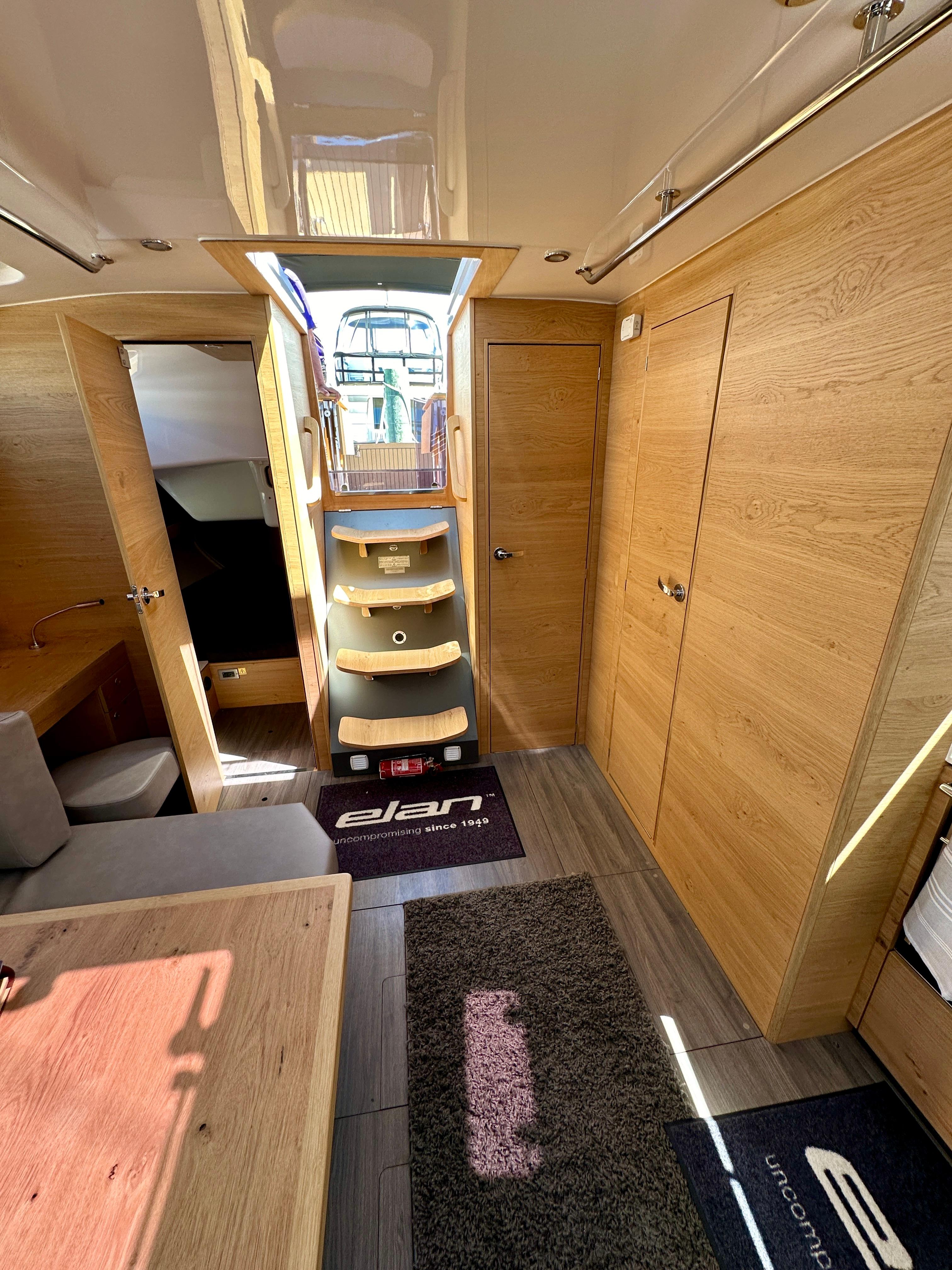 Elan-Impression 43 2024-Hard Loaded CT-US-2024 Elan Impression 43 yacht interior with wooden finish and modern design.-9178291 | Thumbnail