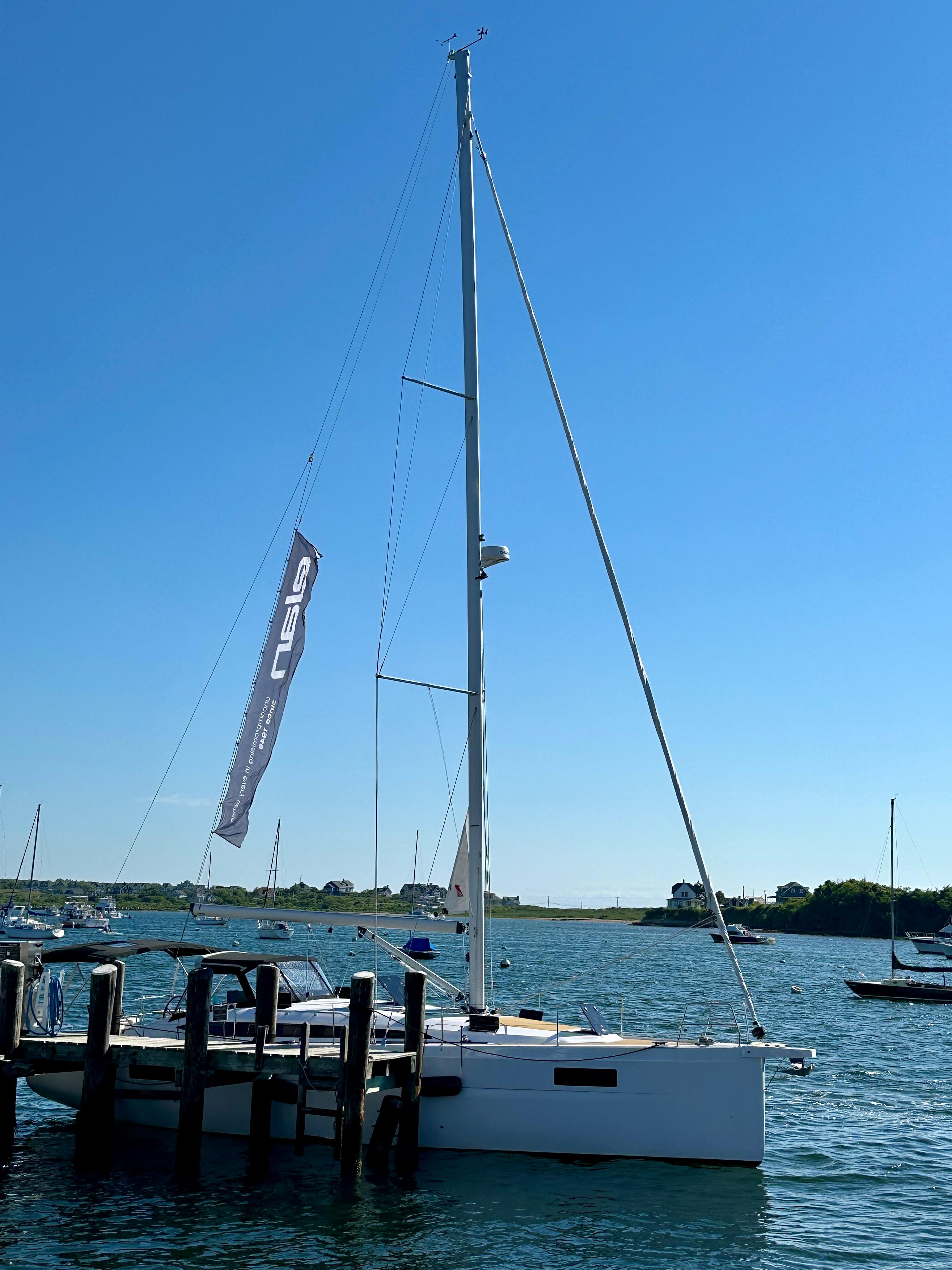 Elan-Impression 43 2024-Hard Loaded CT-US-2024 Elan Impression 43 sailboat docked on a sunny day.-9178291 | Thumbnail