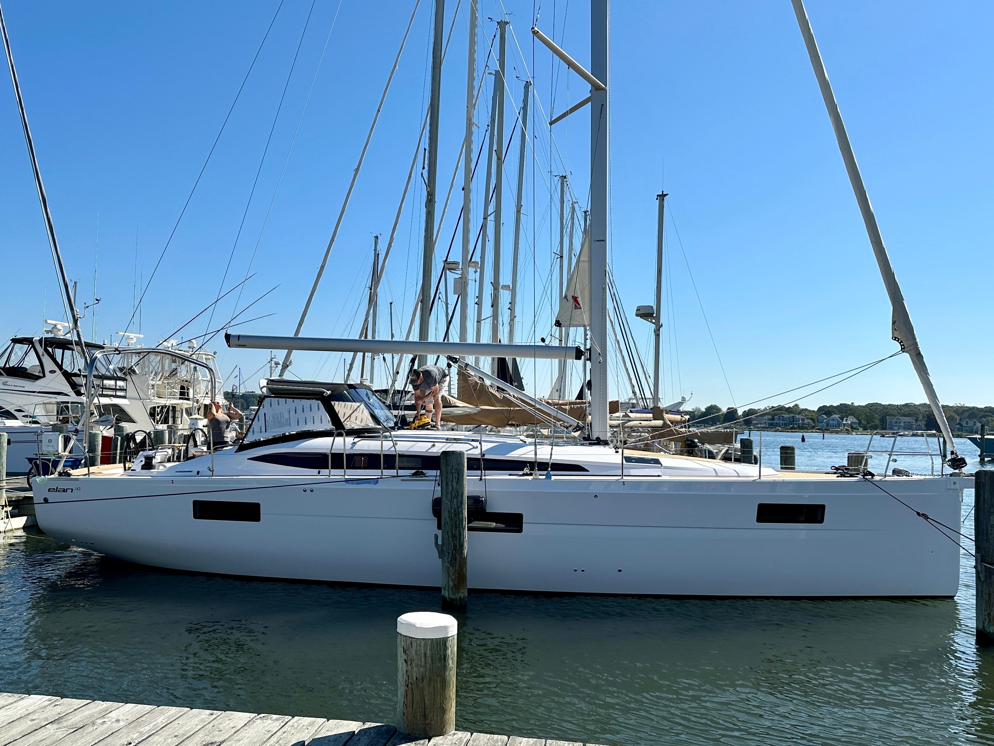 Elan-Impression 43 2024-Hard Loaded CT-US-2024 Elan Impression 43 sailboat docked at a marina.-9178291