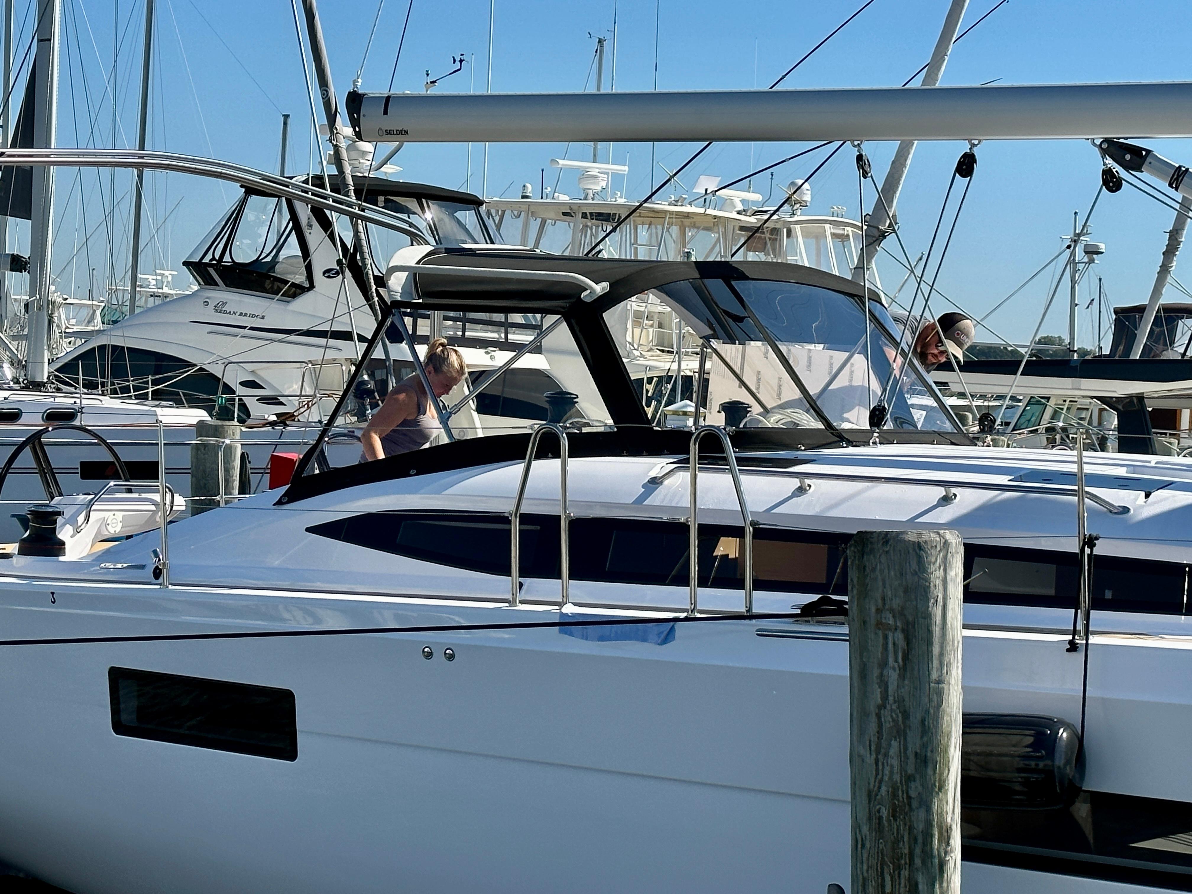 Elan-Impression 43 2024-Hard Loaded CT-US-2024 Elan Impression 43 yacht docked at marina with people onboard.-9178291 | Thumbnail