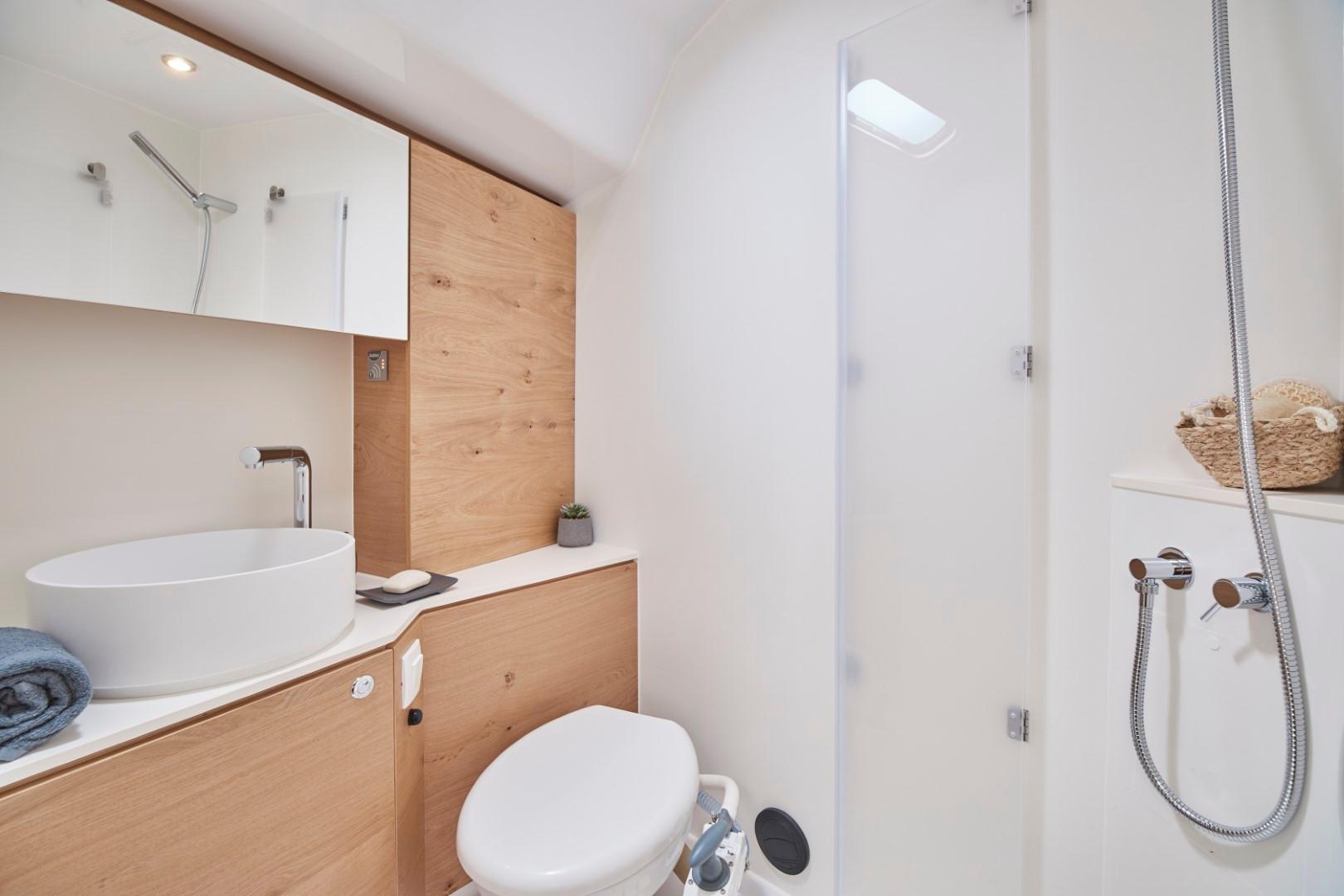 Elan-Impression 43 2024-Hard Loaded CT-US-Modern bathroom in 2024 Elan Impression 43 yacht with wooden accents and sleek fixtures.-9178291 | Thumbnail