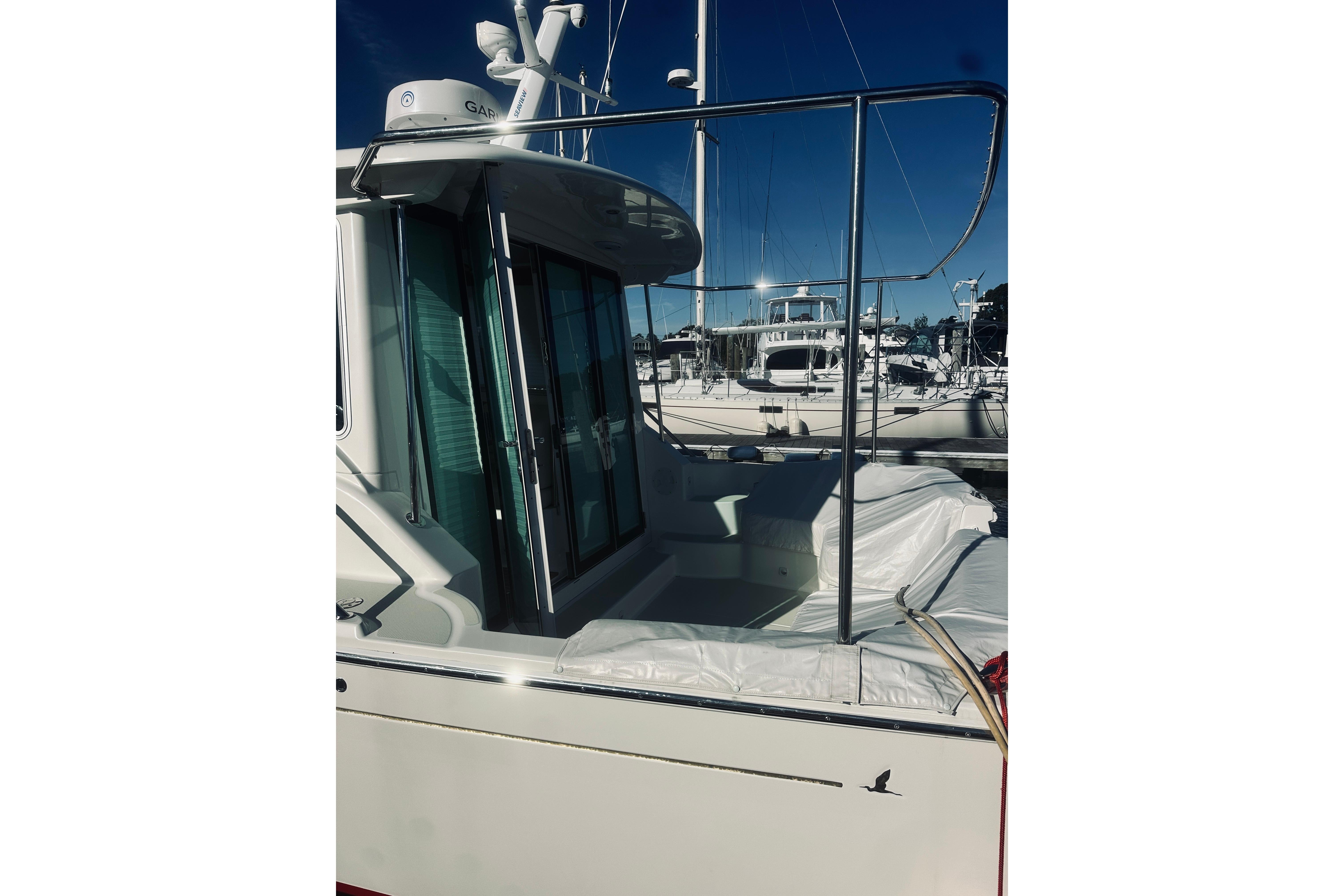 2021 Back Cove 37 yacht docked at marina, showcasing sleek design and modern features.