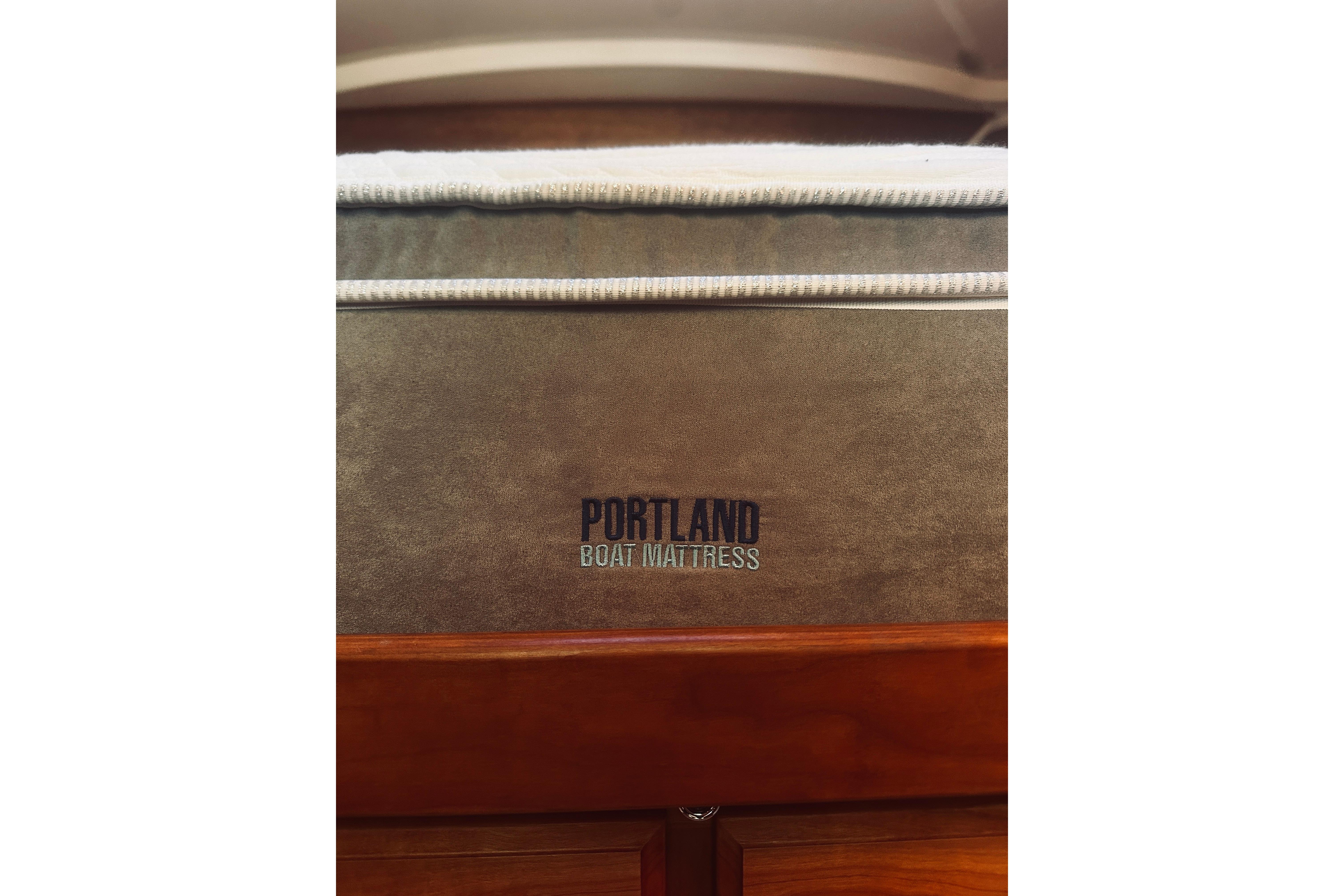 Mattress on 2021 Back Cove 37 boat, featuring Portland Boat Mattress branding.